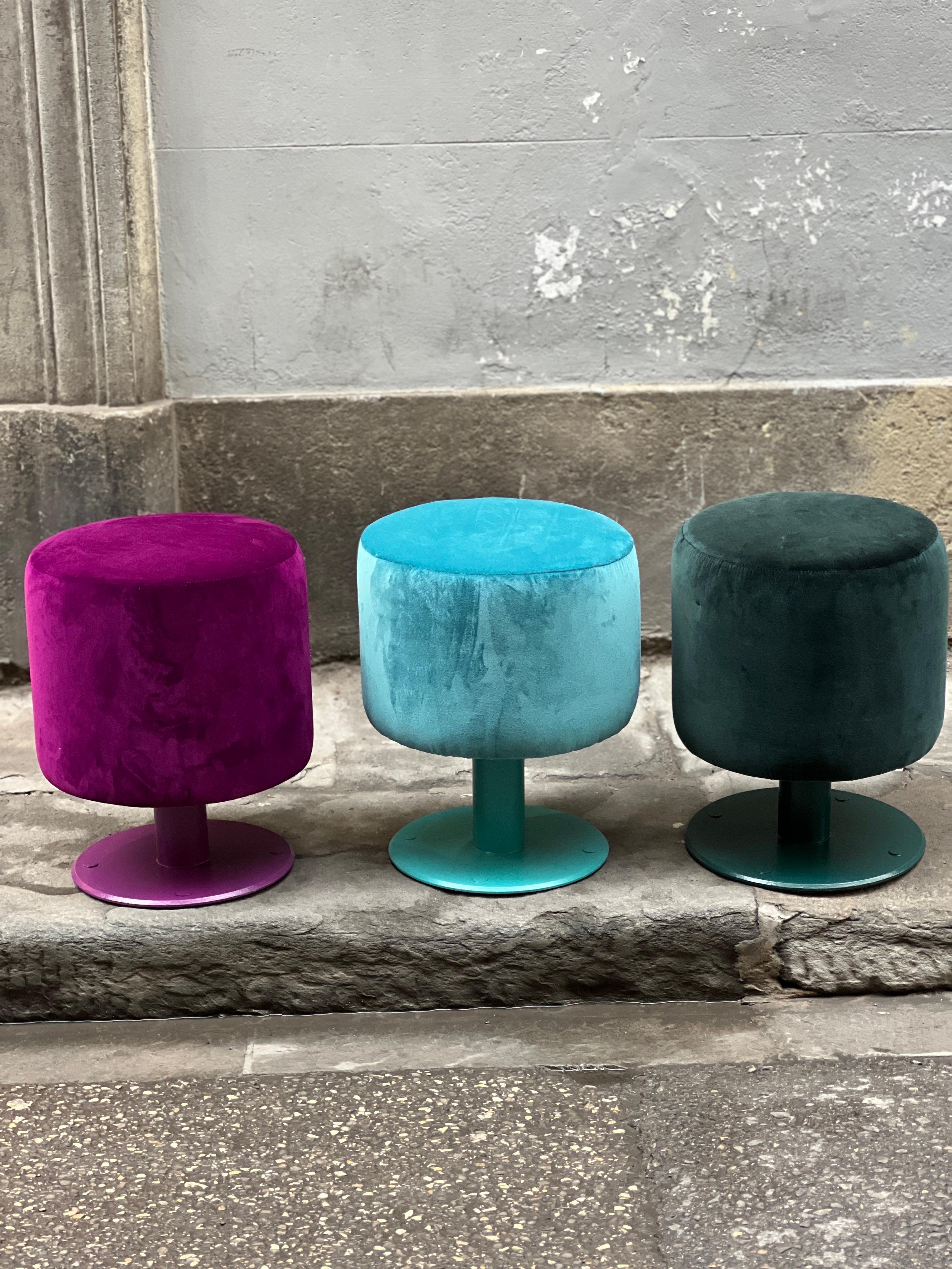 Pair of Vintage Poufs Newly Upholstered in turquoise and cyclamen pink. The metal is lacquered and matching with velvet.
They come from a disused ship, in fact there were holes in the metal base to anchor them to the floor.
Can be sold individually.