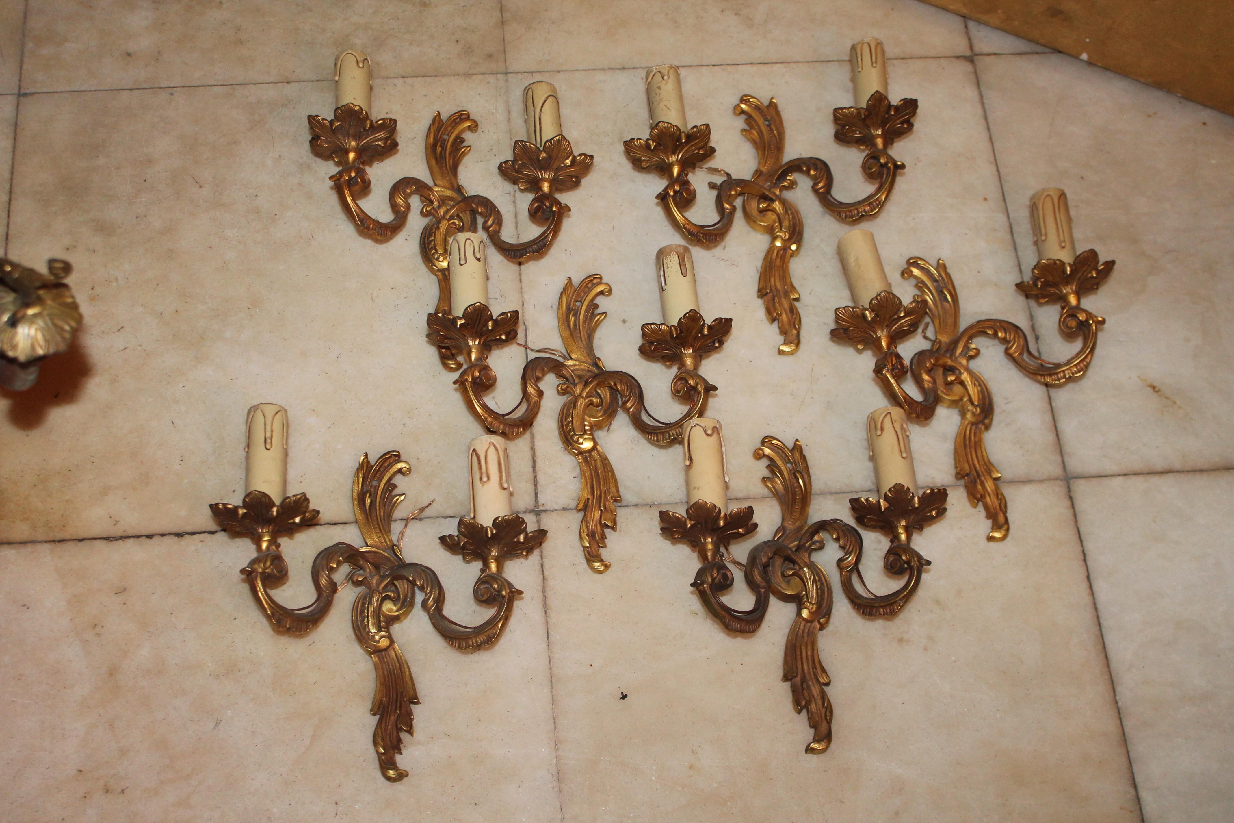 Set of 6 French Louis XV style Dore Bronze Rococo Wall Sconces after Atelier Petitot. Manufactured from the 1940's. Marked.