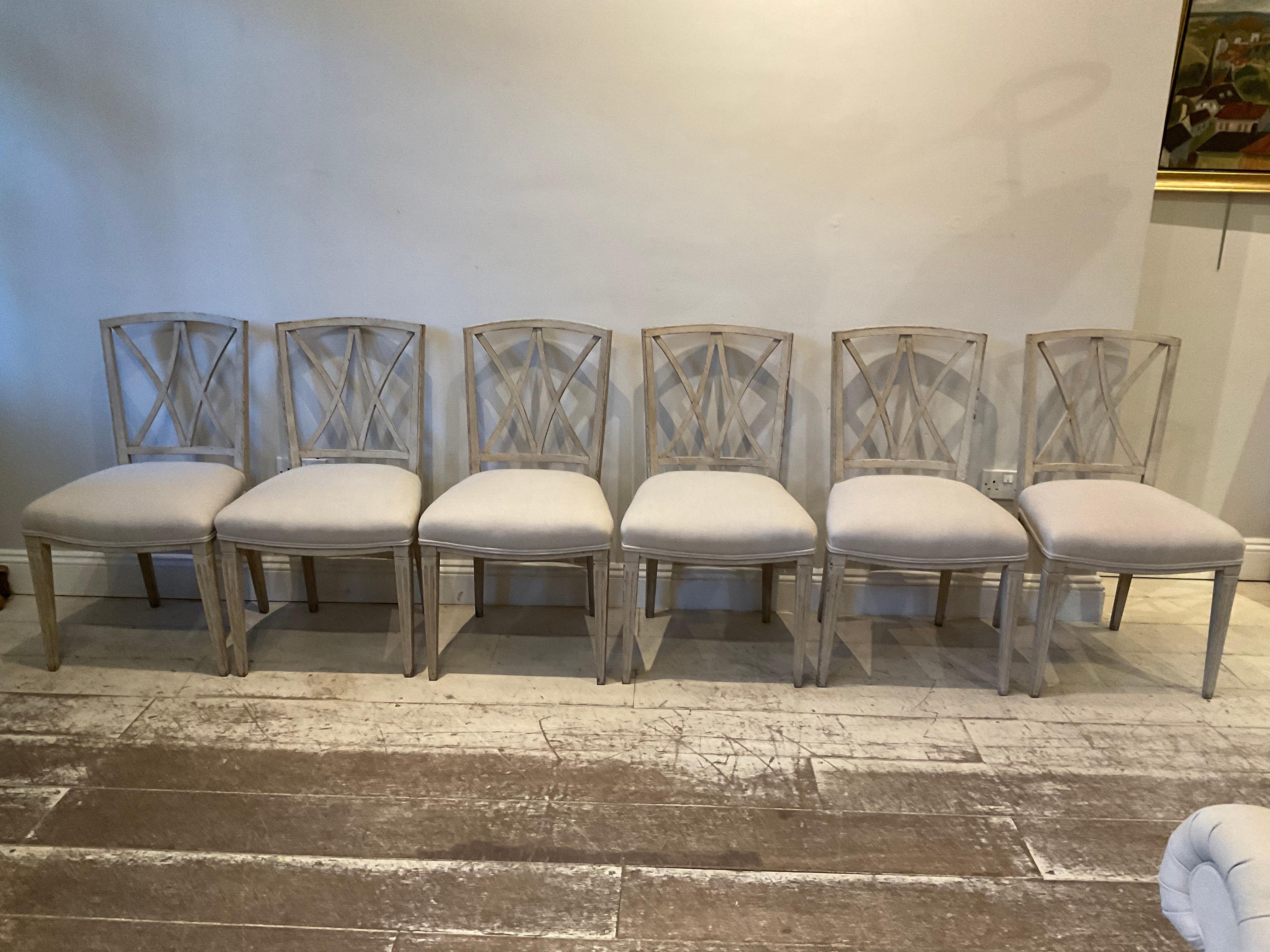 1940s painted dining chairs.
A lovely useful set of Italian dining chairs which have been painted later featuring highly decorative lattice backs.
Upholstered in a neutral linen.
This chairs would work well in many different styles of interior.