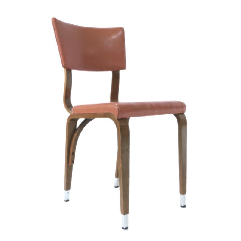 All chairs are sturdy and in good solid condition. These chairs would be great for a restaurant or cafe. Solid bent plywood frames with a light terracotta colored seat and back. Very usable and versatile classic design that would mix well with