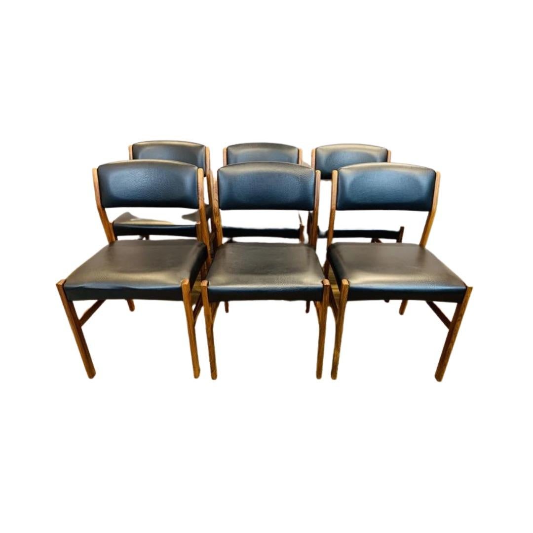 Set of 6 Danish Hugo Frandsen for Spøttrup Stolefabrik Danish rosewood and leather dining chairs. The chairs are very comfortable and well padded but on the seats and backrests. The sculptured backs are angled to provide the back with maximum