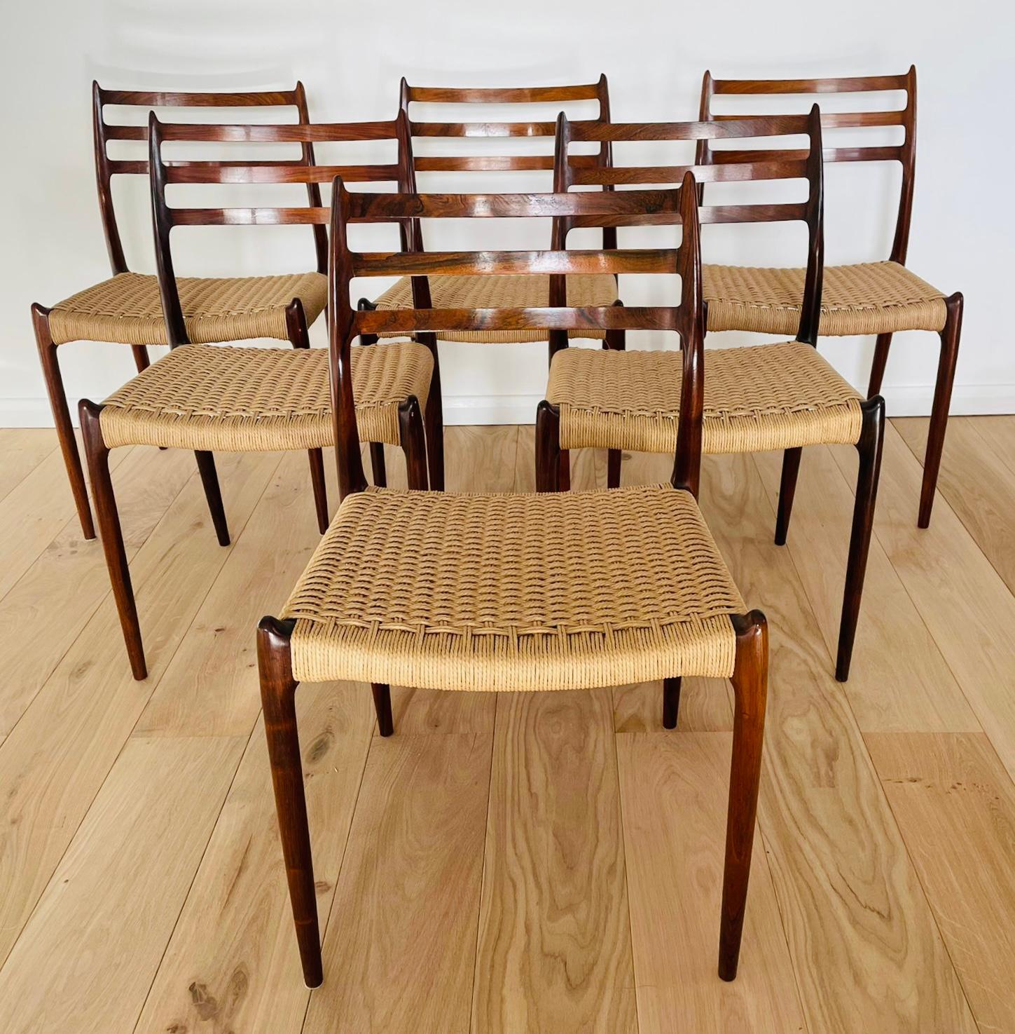 Set of 6 1960s Danish solid Rosewood dining chairs designed by Niels Otto Møller. Manufactured by J. L. Møllers Mobelfabrik, Denmark in 1962. Model 78. These organically shaped chairs are all from early production and all feature the makers