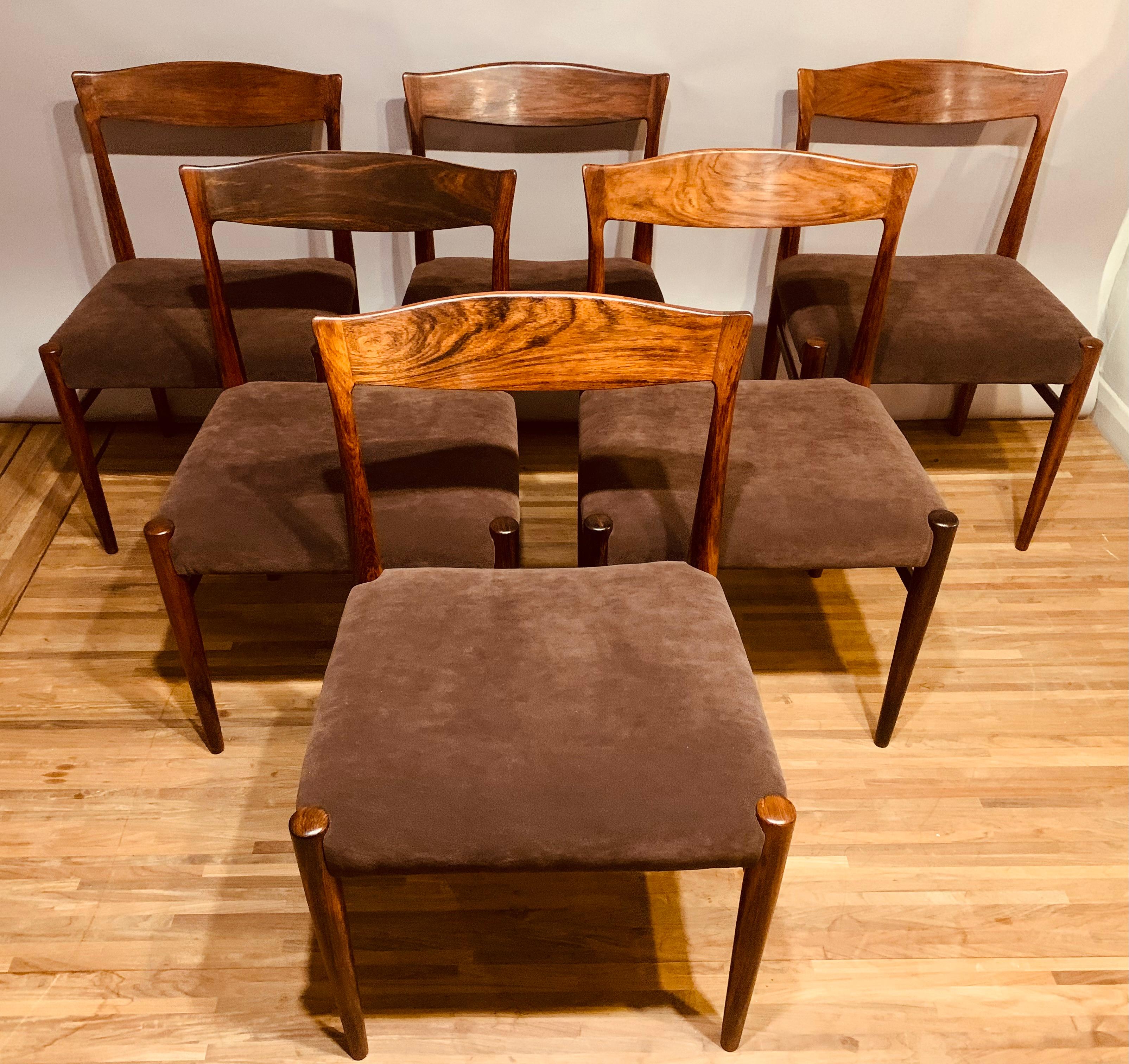 A rare set of six Danish Rosewood stylish dining chairs designed by Erling Torvits. Manufactured by Sorø Stolefabrik during the 1960s. Year of design 1964. The chairs are very well made with a rich grained patina to the solid rosewood frames. The