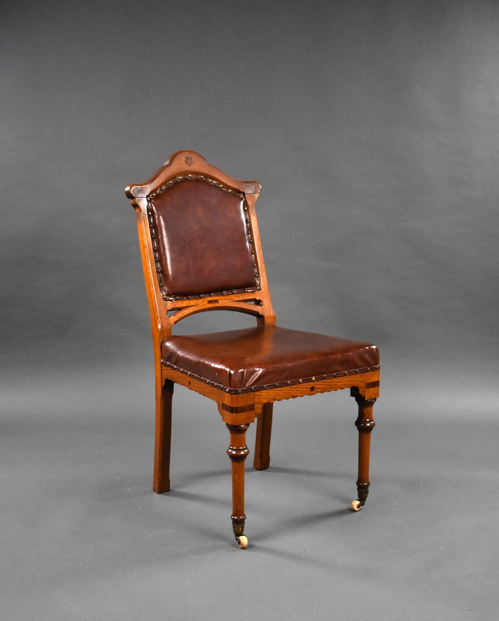 For sale is a set of 6 Victorian oak dining chairs, upholstered in leather, raised on turned legs terminating on castors. All of the chairs are in good condition and remain structurally sound. The upholstery on the seats has shrunk slightly (see