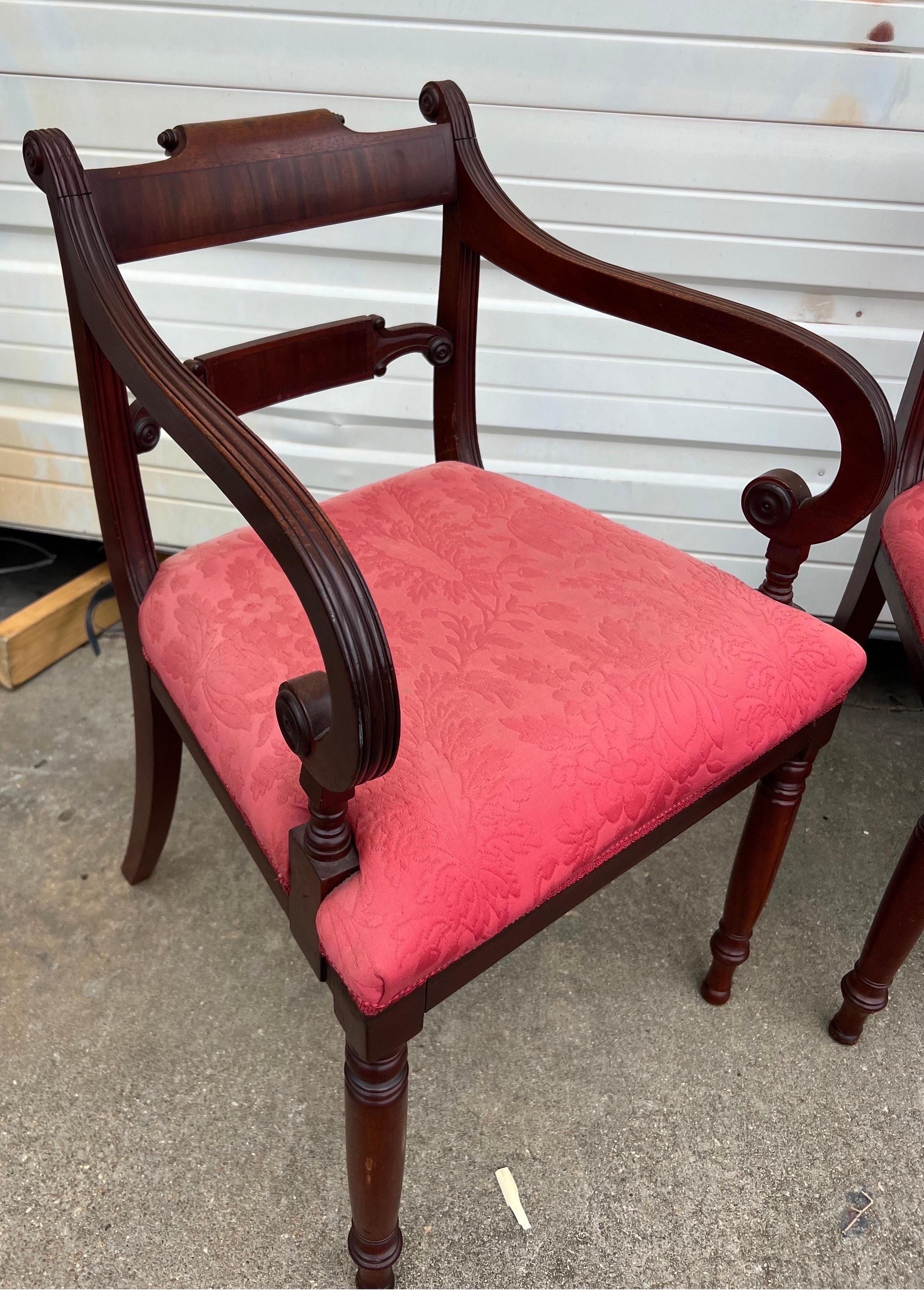 Great set of 8 19th century mahogany English Regency dining chairs with tablet formed backs, scrolled ears and handsome turned legs. 2 Arms and 6 Sides. Great quality mahogany and in their original finish. Ready for reupholstering.
