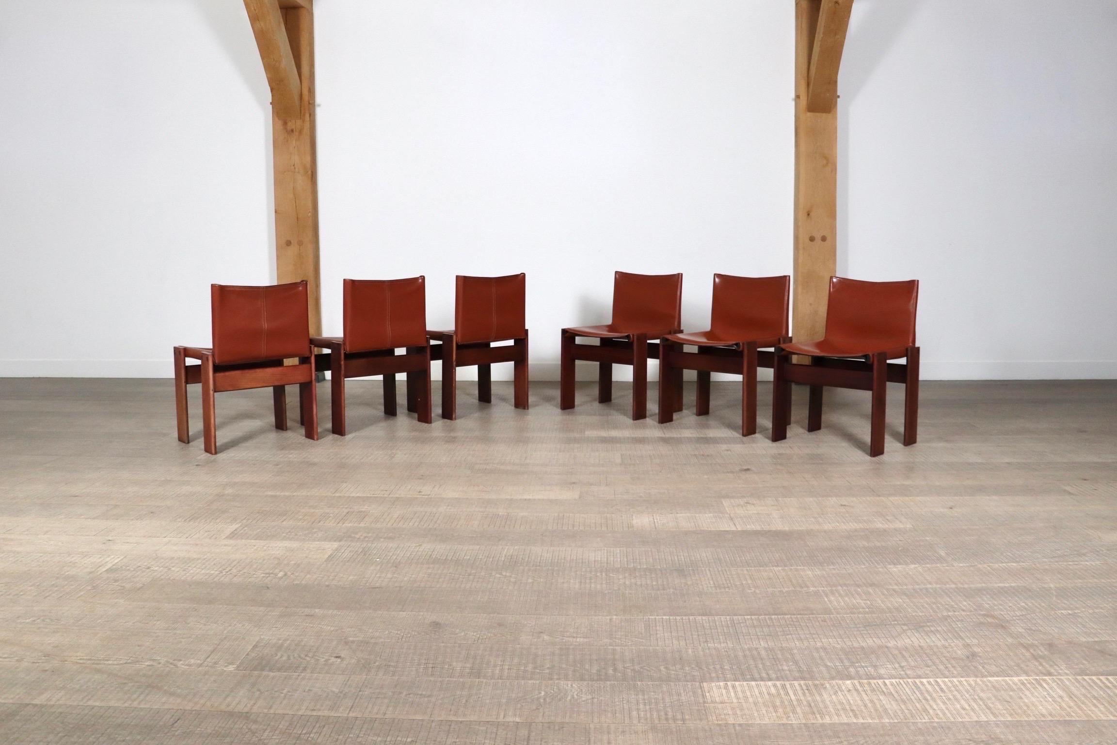 Fantastic set of 6 ‘Monk’ chairs designed by Afra and Tobia Scarpa for Molteni, Italy 1974. This design features a solid walnut wooden frame with nicely patinated deep cognac leather seating. The sober design, after its name “Monk” is complemented