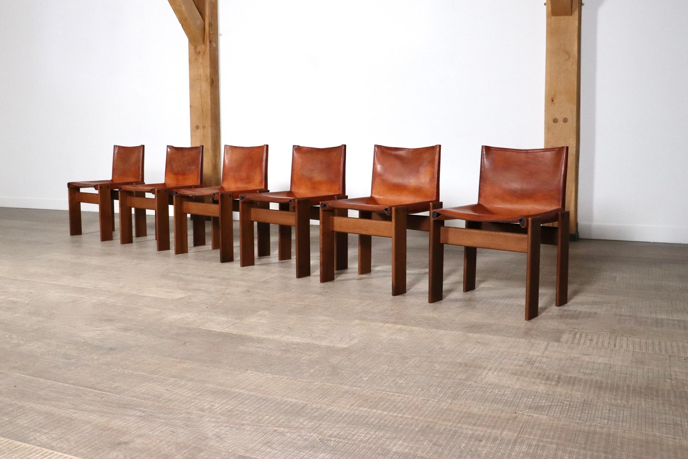 Fantastic set of 6 ‘Monk’ chairs designed by Afra and Tobia Scarpa for Molteni, Italy 1974. This design features a solid walnut wooden frame with nicely patinated cognac leather seating. The sober design, after its name “Monk” is complemented with
