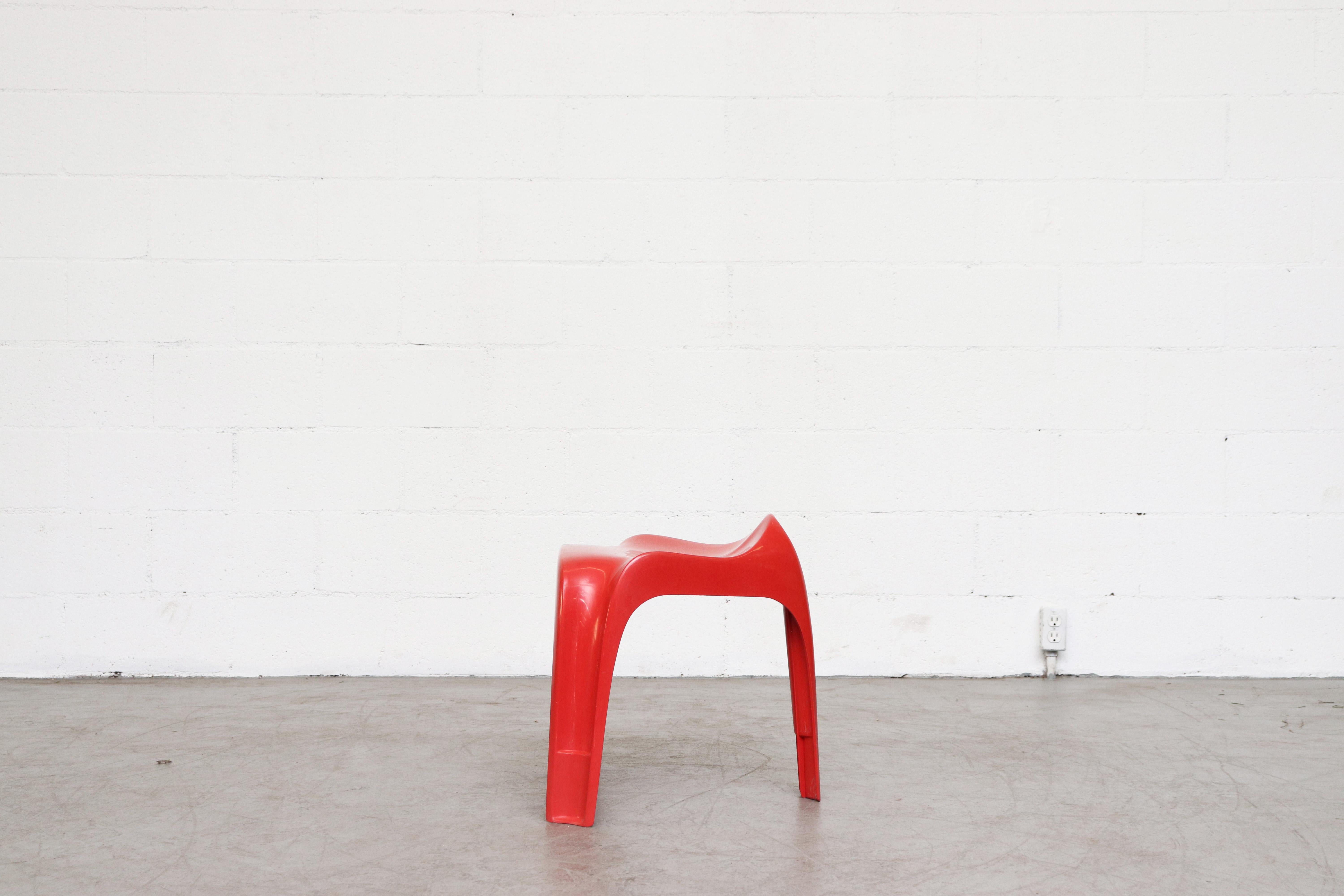 red plastic stools