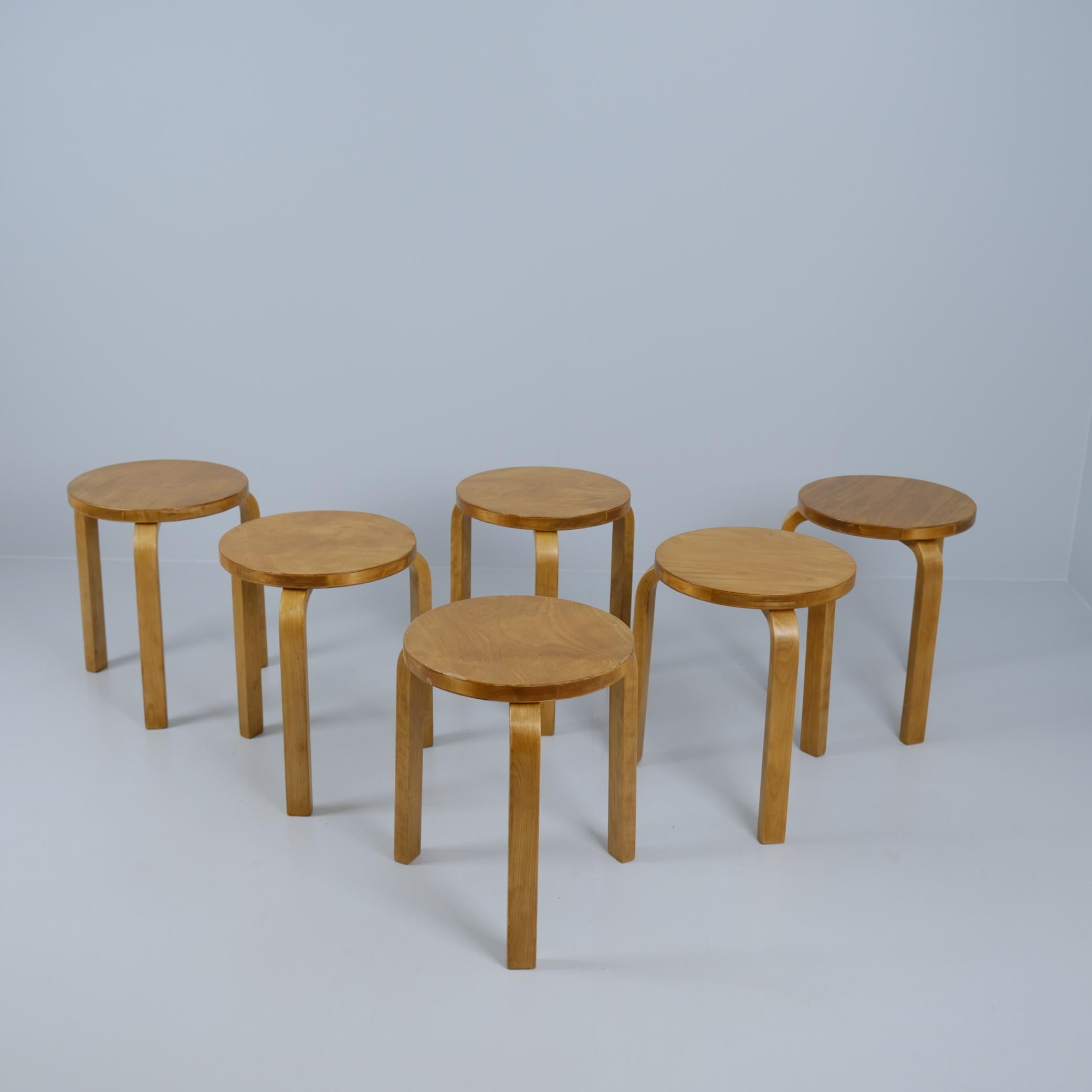 These six Alvar Aalto iconic stools from 1930s are beautiful and space saving furniture pieces of timeless design. The legs are mounted directly to the underside of the round seat without the need for complicated connecting elements. The stools can