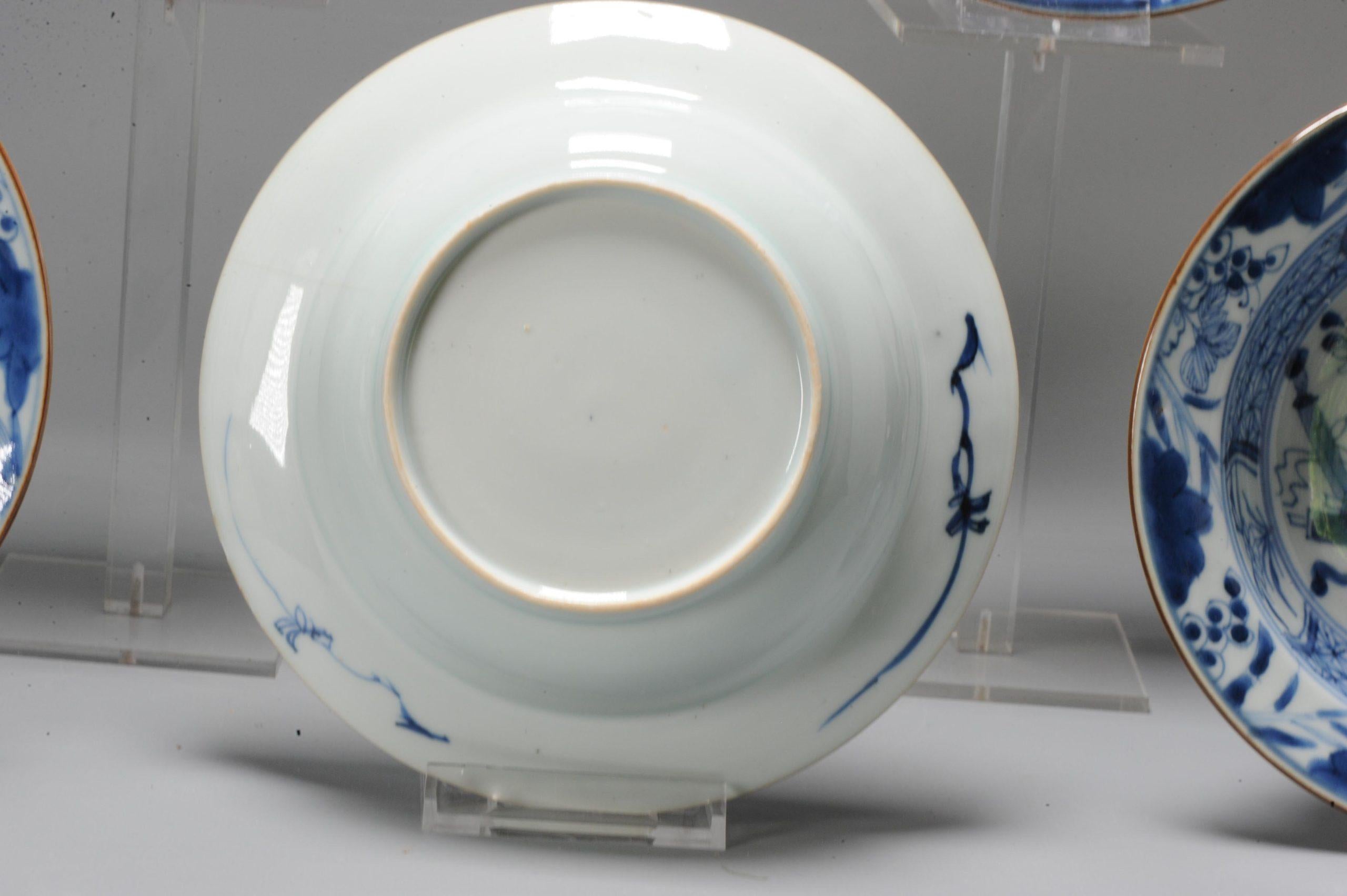 A very nicely decorated SET of 6 dishes in Blue and white with a lovely and high quality garden scene with flowers, rocks and a table rock with an incense burner, books and a vase. The border with flowers, scrolls, geometric design and butterflies.