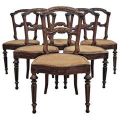 Set of 6 Antique Dining Chairs with Cane seats, solid walnut France Mid 19th C.