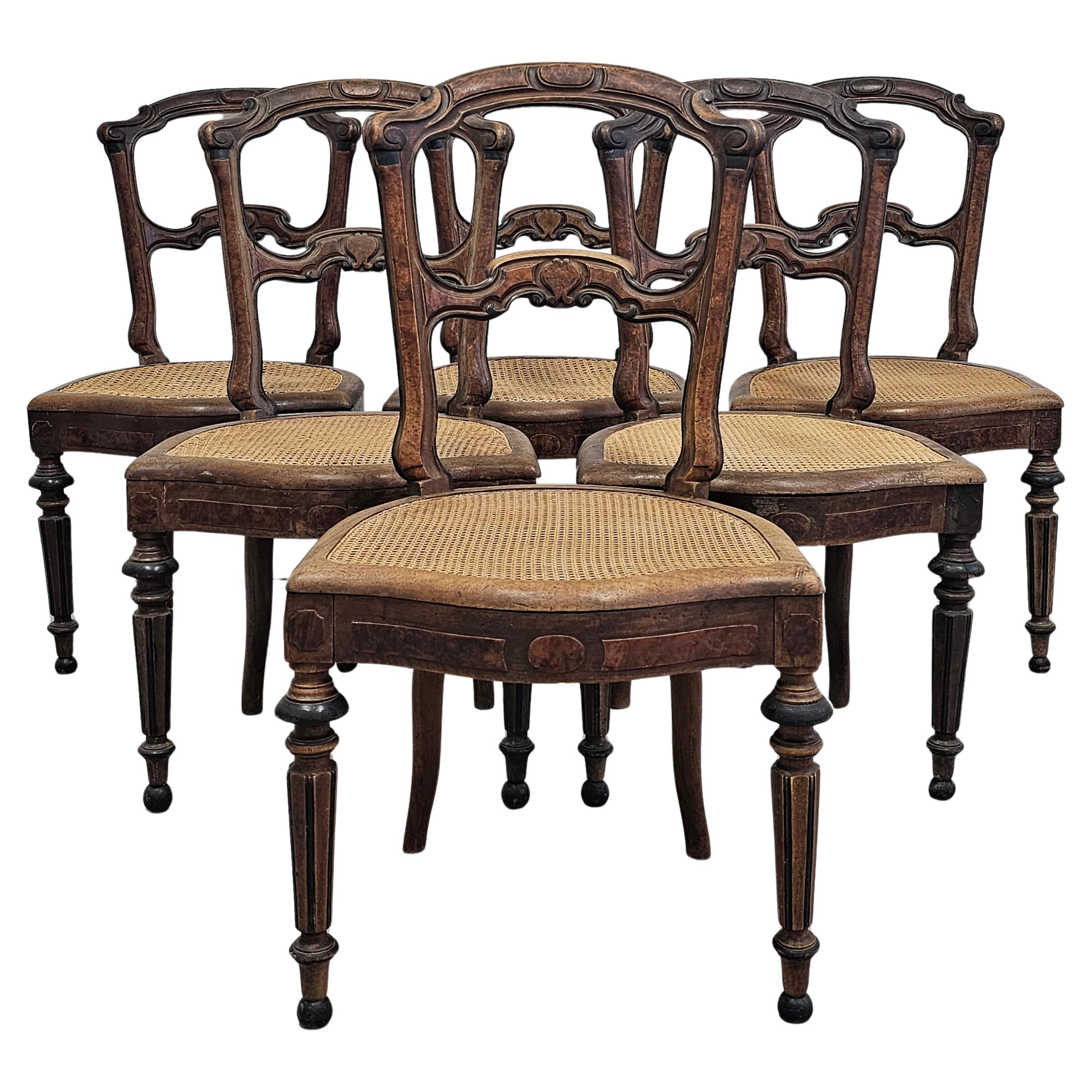 Ensemble de 6 chaises de salle à manger anciennes avec sièges en cannage, noyer massif France Mid 19th C. en vente