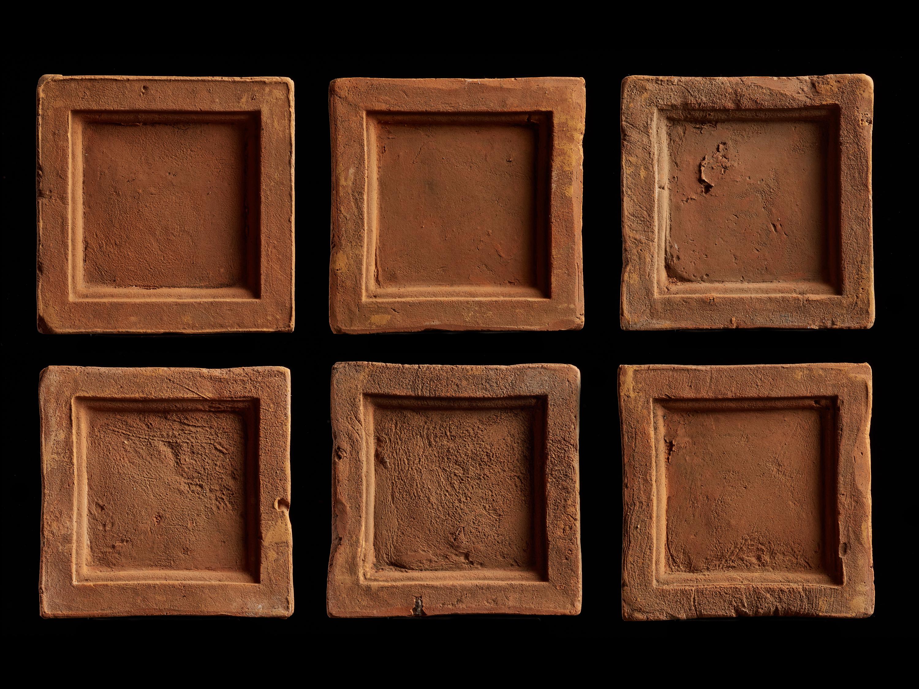 Set of 6 antique earthenware tiles.