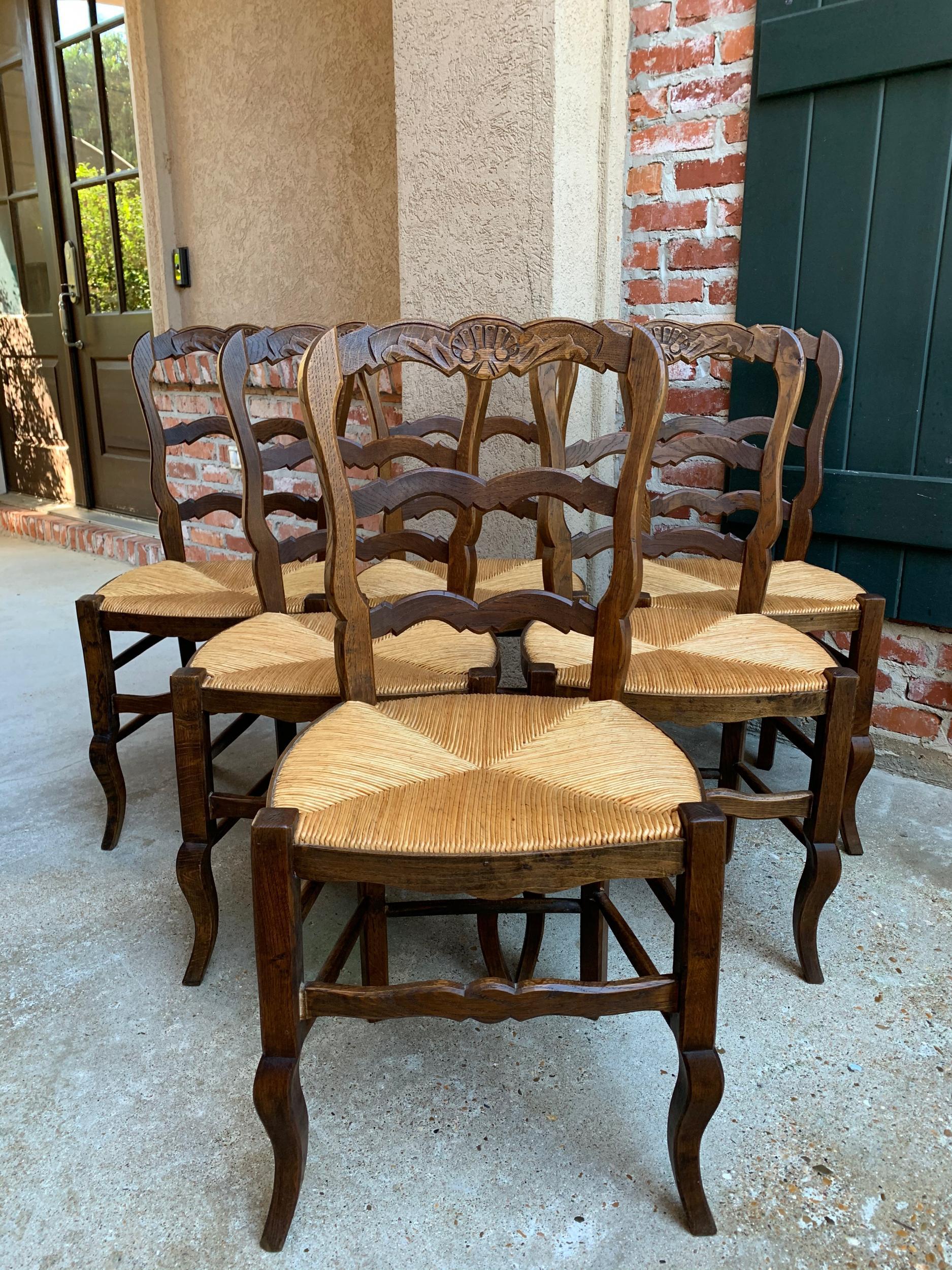 Set of 6 Antique French Carved Dark Oak Ladder Back Dining Chair Rush Seat In Good Condition In Shreveport, LA
