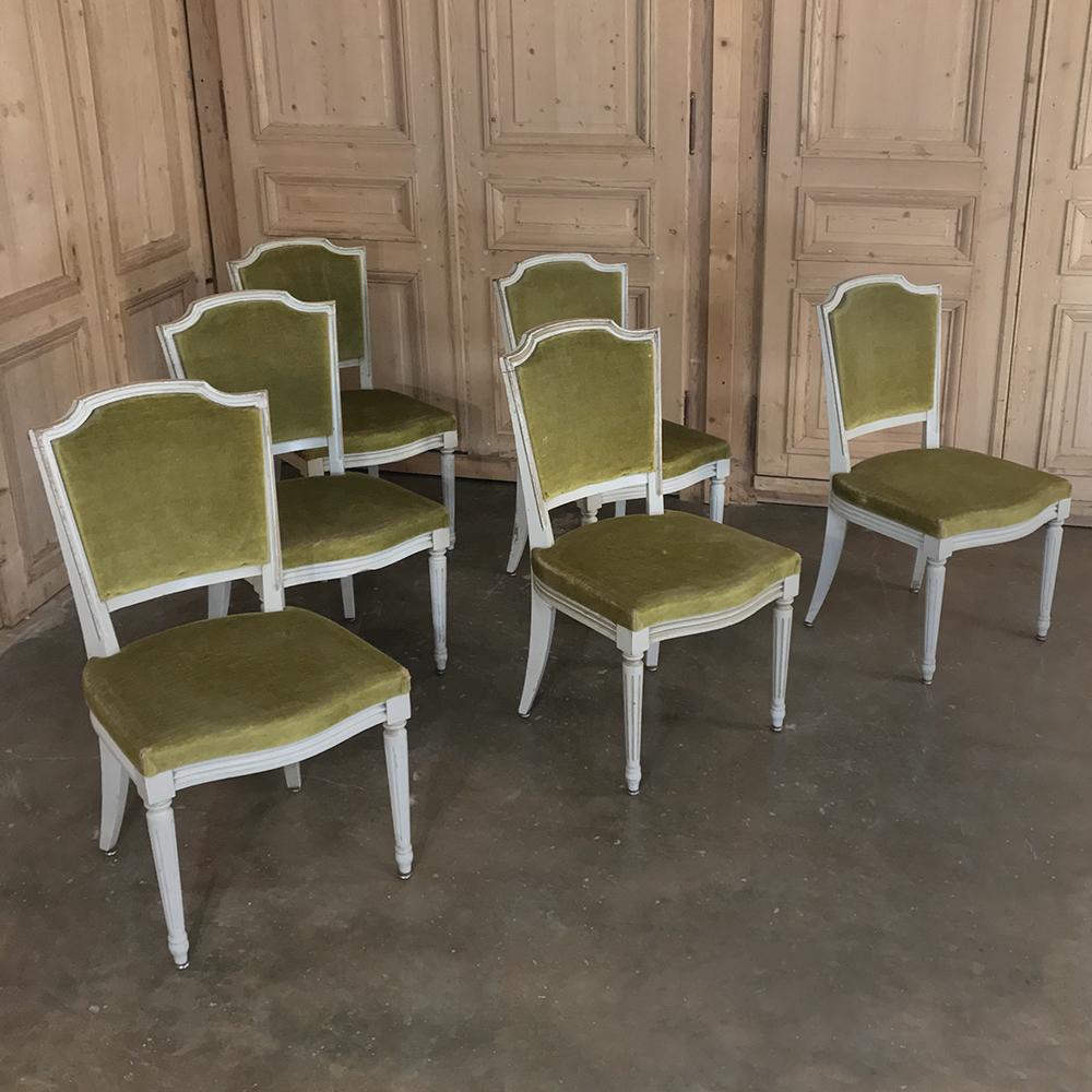 Set of 6 antique French Louis XVI painted dining chairs feature tailored lines with tapered and fluted legs, all enhanced by the patina of the painted finish. Upholstered in serviceable mohair,
circa early 1900s
Each measures 37 H x 18.5 W x 18.5