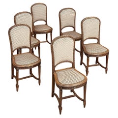 Set di 6 sedie da pranzo imbottite in noce di Antique French Louis XVI