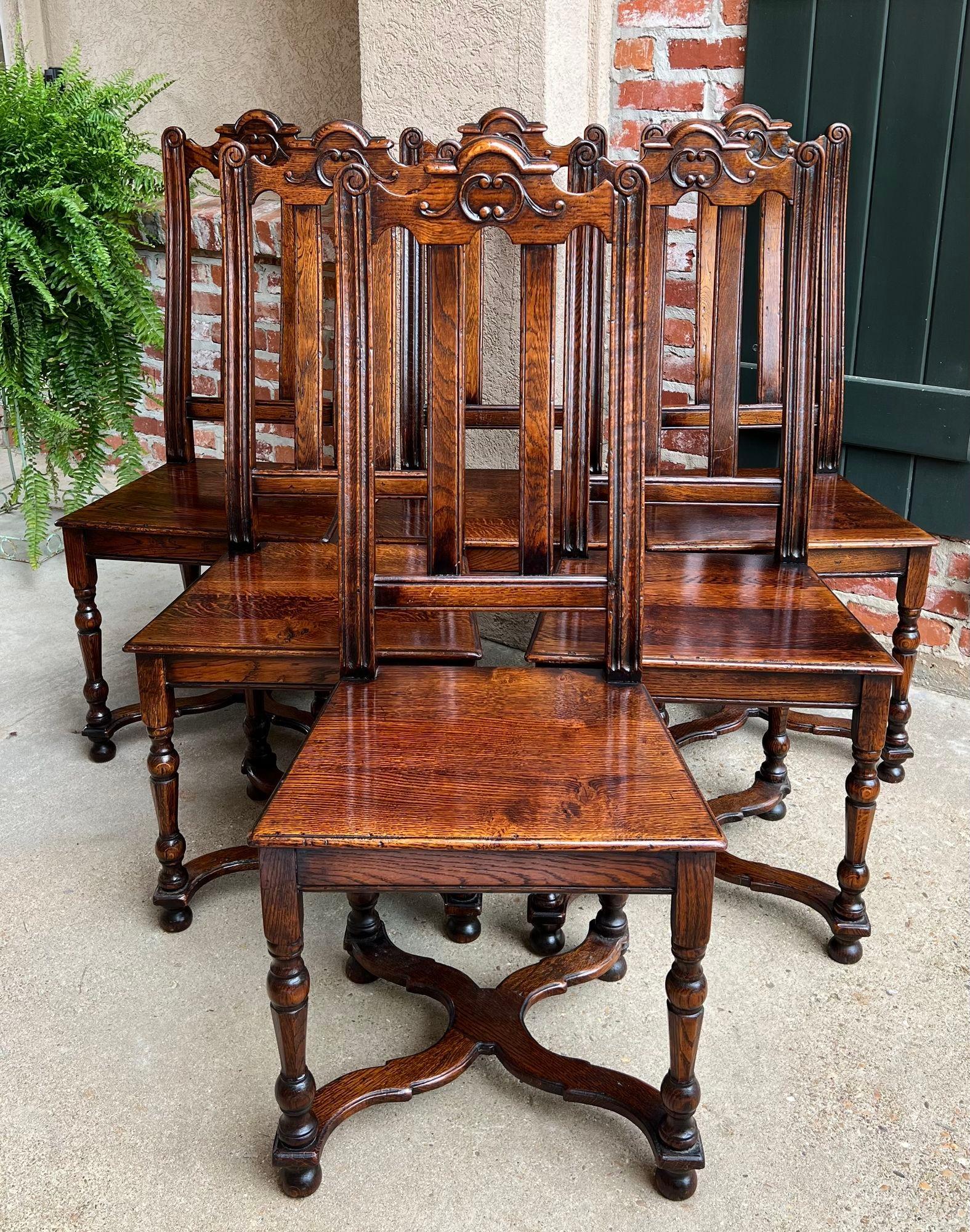 Set 6 antique French provincial Country style dining chairs carved oak.

Direct from France, a lovely set of 6 antique French chairs, perfect for either a dining room or kitchen with their distinctive French charm. The chairs have ornate