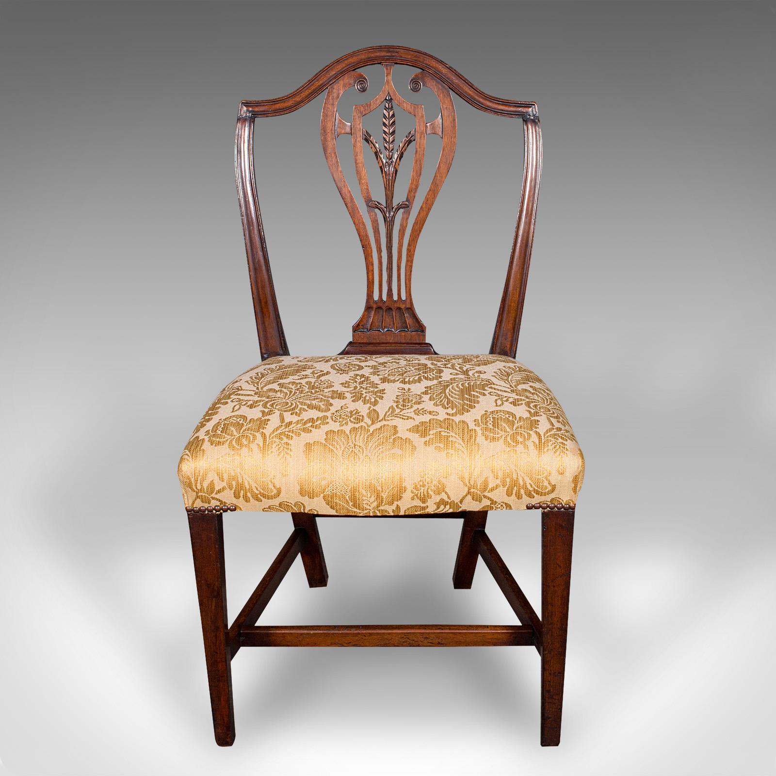 
This is a set of 6 antique Hepplewhite revival dining chairs. An English, mahogany lyre back seat, dating to the Victorian period, circa 1880.

Pleasingly wide set of dining chairs with delightful upholstery
Displaying a desirable aged patina and