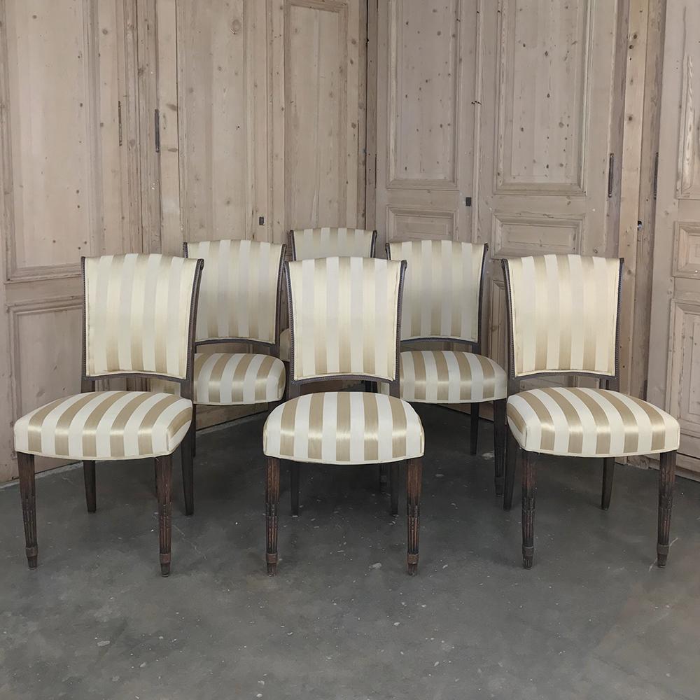 Set of 6 antique Louis XVI dining chairs feature tailored classical architecture with swept back seat crowns and generous seats for amazing comfort in style!,
circa early to mid-1900s
Each measures 38 H x 20.5 W c 19 D, seat 20 H.