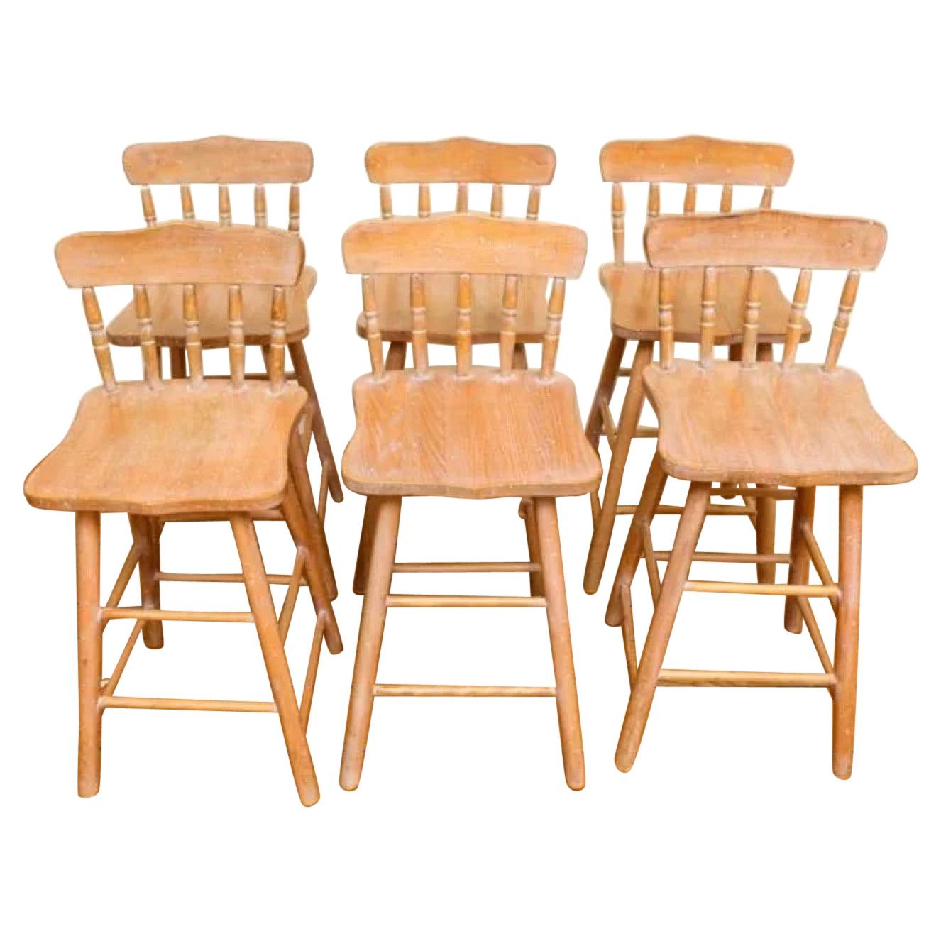 Pair of Provincial Carved Wooden Bar Stools with Rushed Seats For Sale