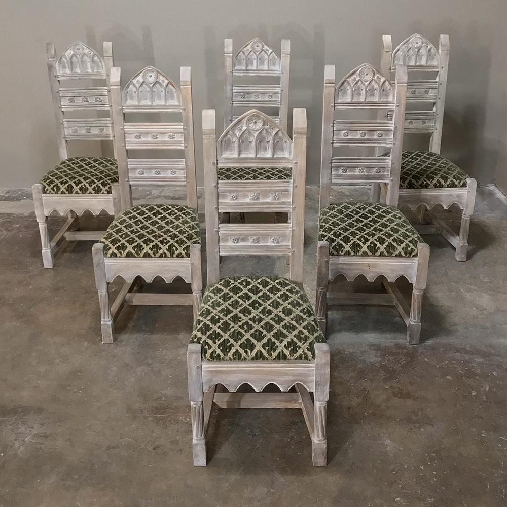 Set of 6 antique rustic French gothic whitewashed dining chair was literally designed to last for decade after decade, hand-crafted from thick, solid planks of old growth oak, with time-honored mortise & tenon joinery and carved Gothic motifs on the