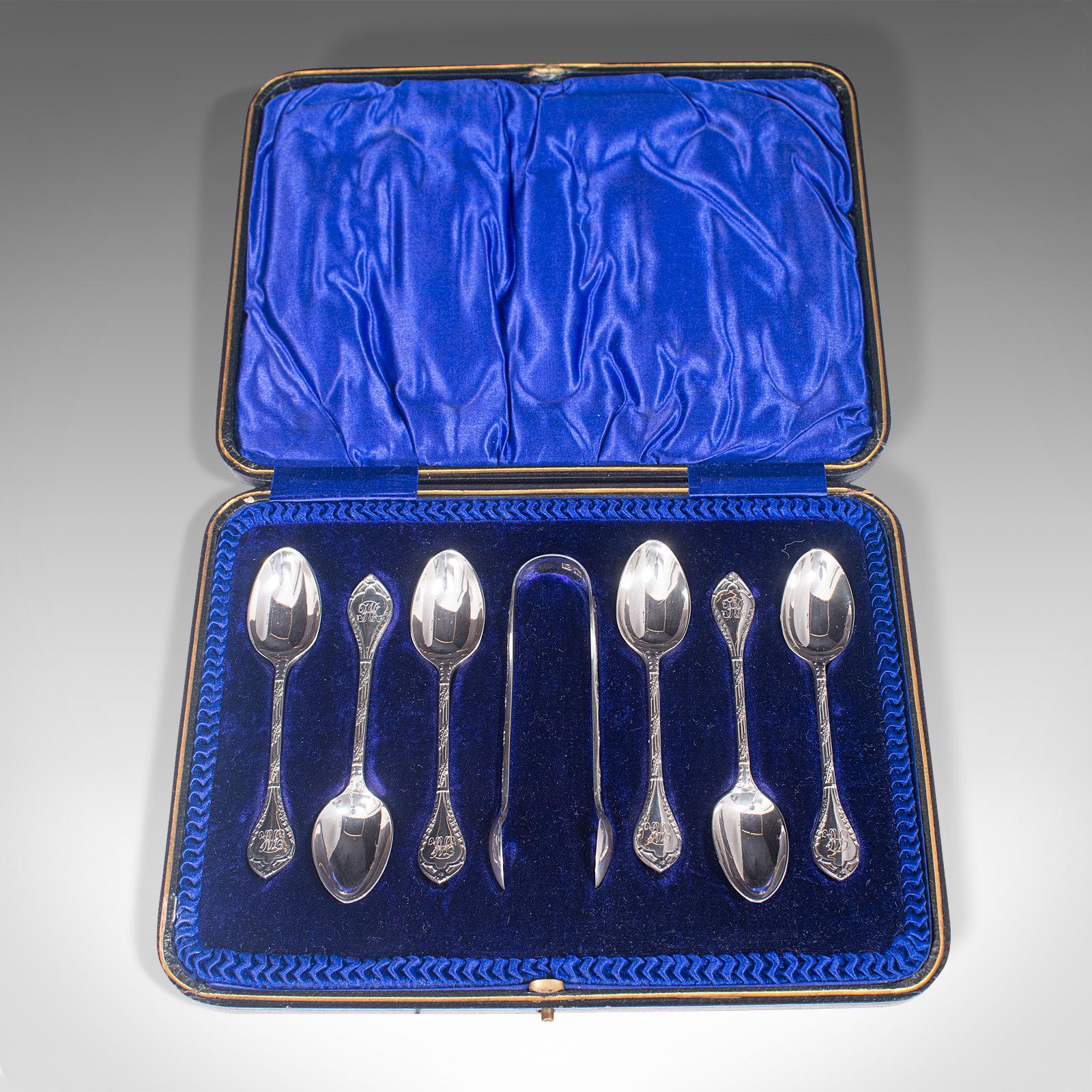 This is a set of 6 antique tea spoons. An English, silver cutlery case with tongs, hallmarked in the late Victorian period, 1900.

Beautifully presented set with delicate, ornate detail
Displays a desirable aged patina throughout
Quality silver