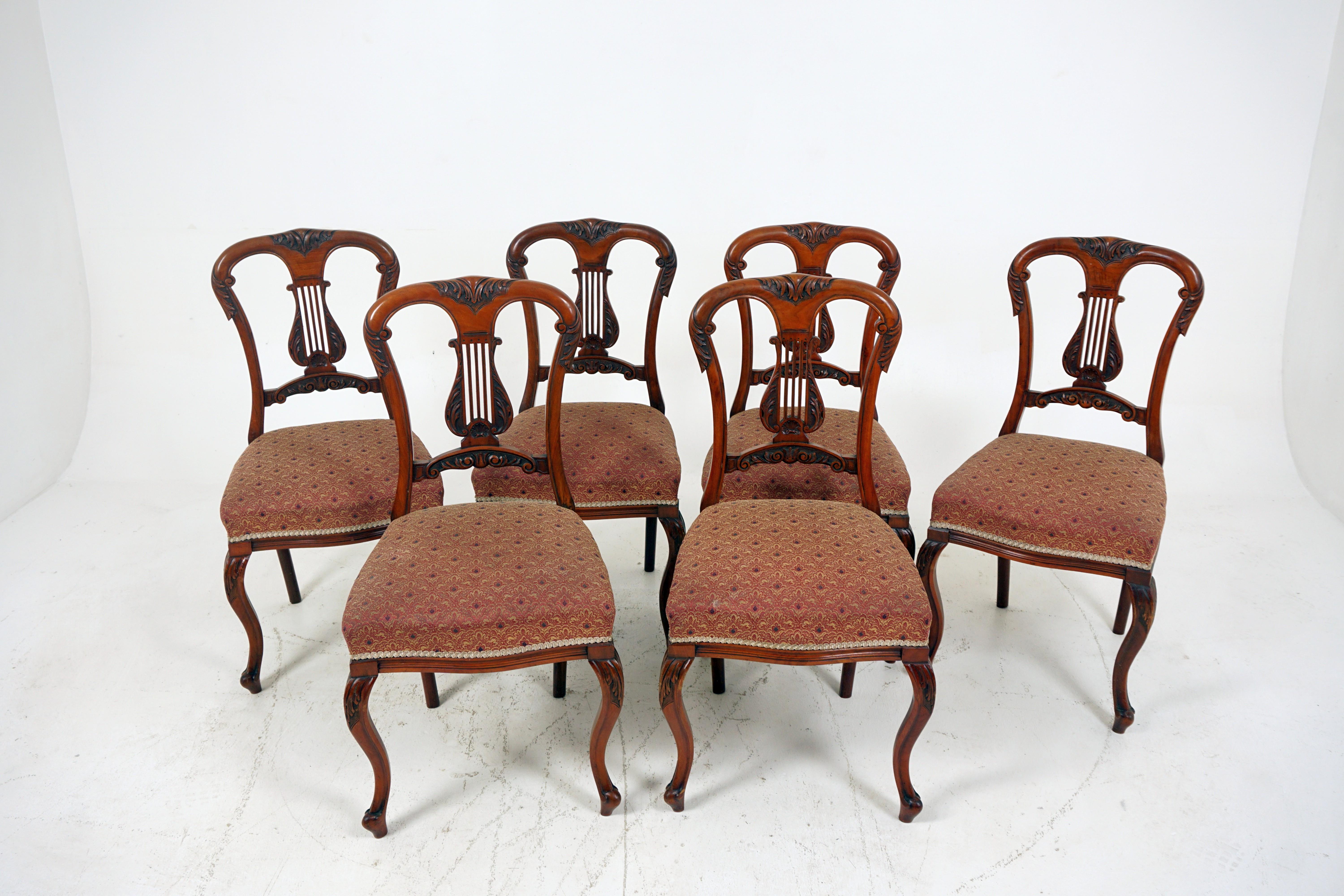 Set of 6 Antique Victorian Carved Walnut Dining Chairs, Scotland 1890, H223

Scotland 1890
Solid Walnut 
Original finish 
Carved top rail
Harp shaped open back
Upholstered seat
All standing on carved cabriole legs to the front
Wonderful quality and
