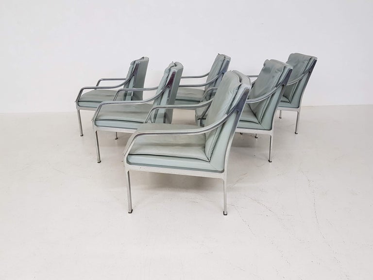 Six mint green leather lounge chairs with polished stainless frame, designed for the Knoll 
