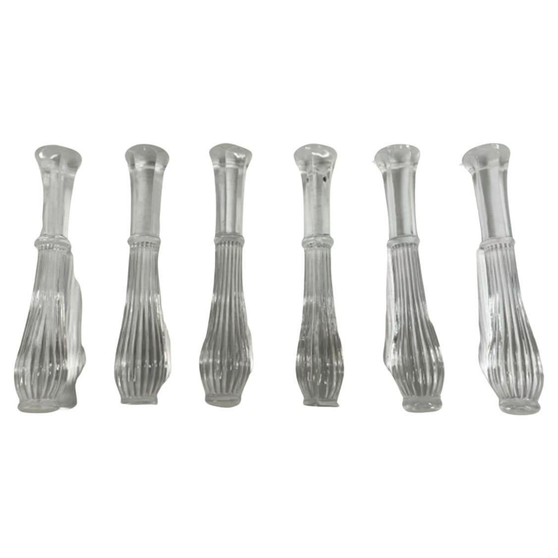 Six Art Deco colorless glass muddlers of baluster form with a reeded top with disk finial above a ring with six-sided lower section ending in a frosted foot.