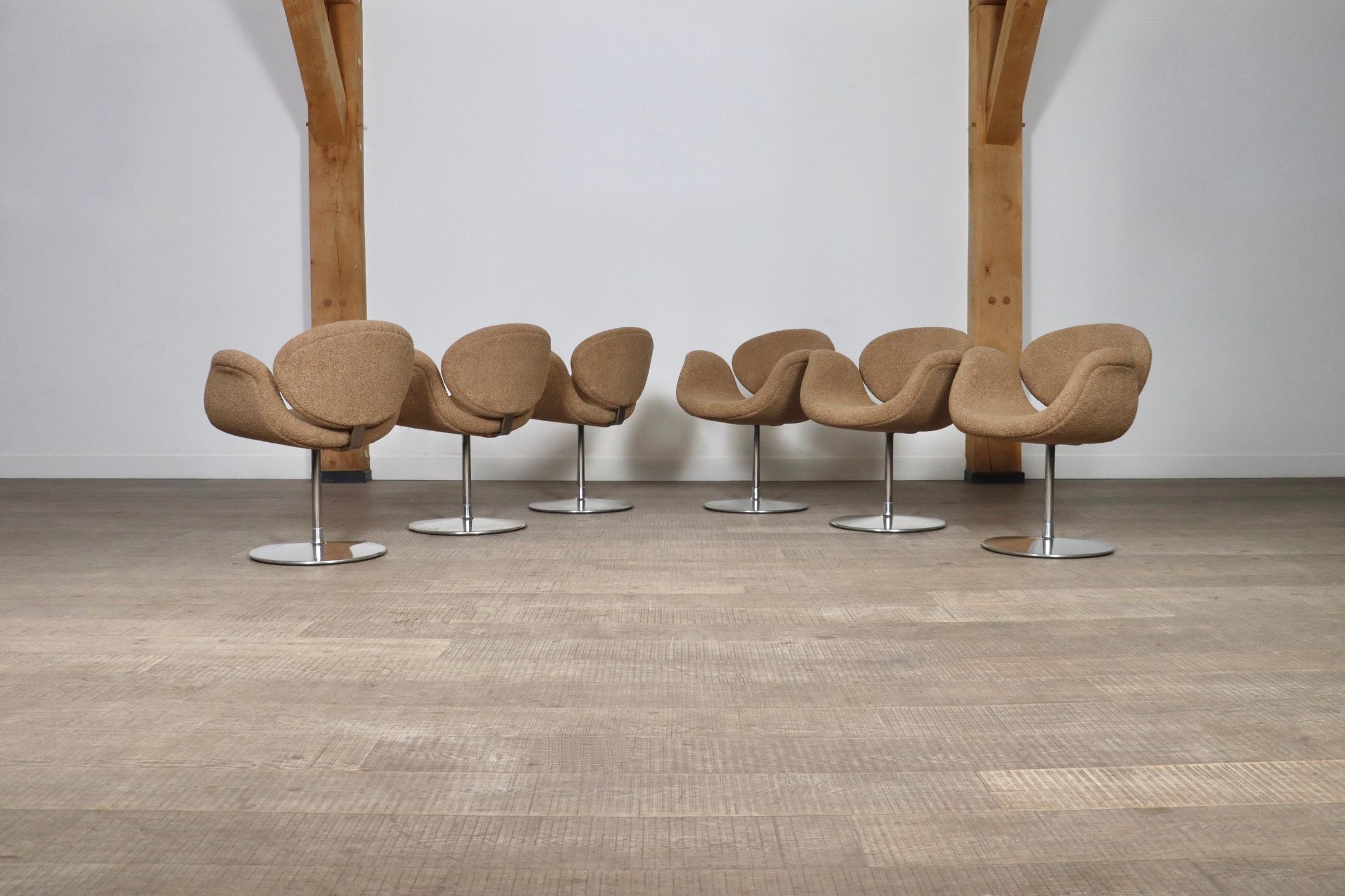 Nice set of 6 swivel dining chairs model Little Tulip by Pierre Paulin for Artifort, reupholstered in a soft beige teddy fabric and a chrome base. This fun, yet highly comfortable design will be a nice addition for any dining room. The padded