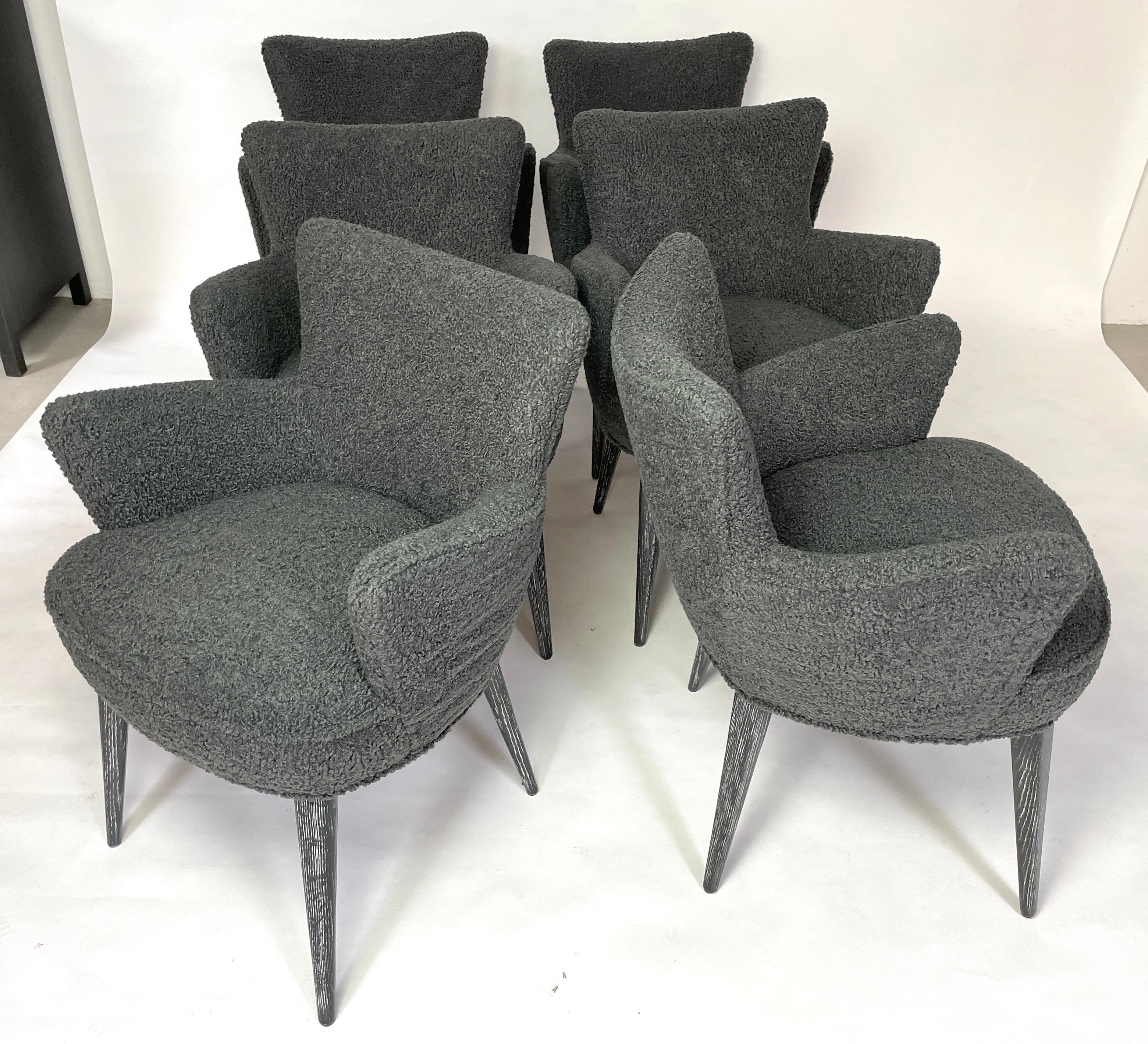 This stylish chair can stand alone as a side chair or is perfect in the dining room. It has modern lines, but the oak legs will sit well with any wood furnishings. The curved frame
hugs you comfortably with the armrest being at a perfect height.