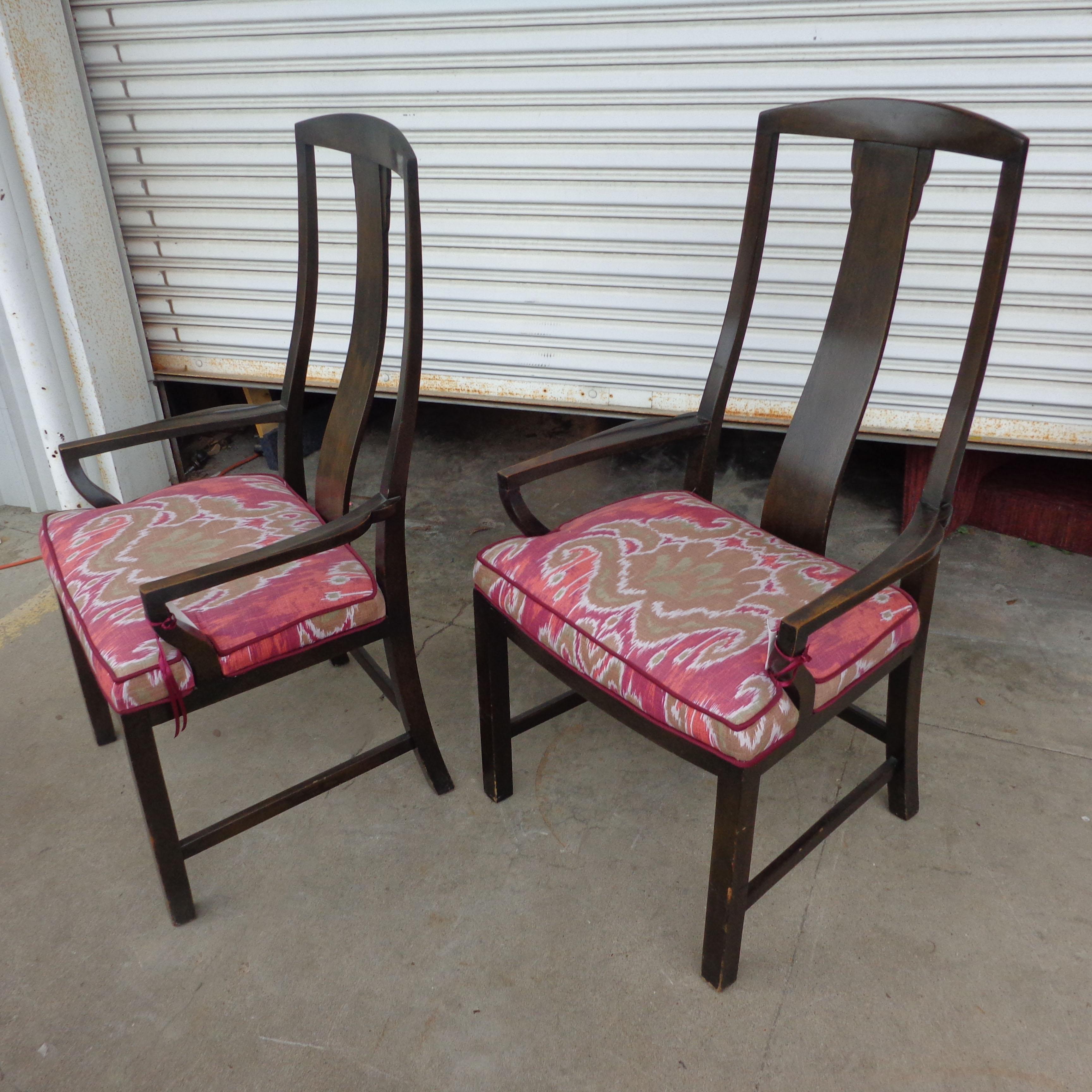 Set of Baker dining chairs

Dark walnut consisting of 4 arm and 2 side chairs reupholstered in a bright Ikat print.

Measures: Seat height 18.5