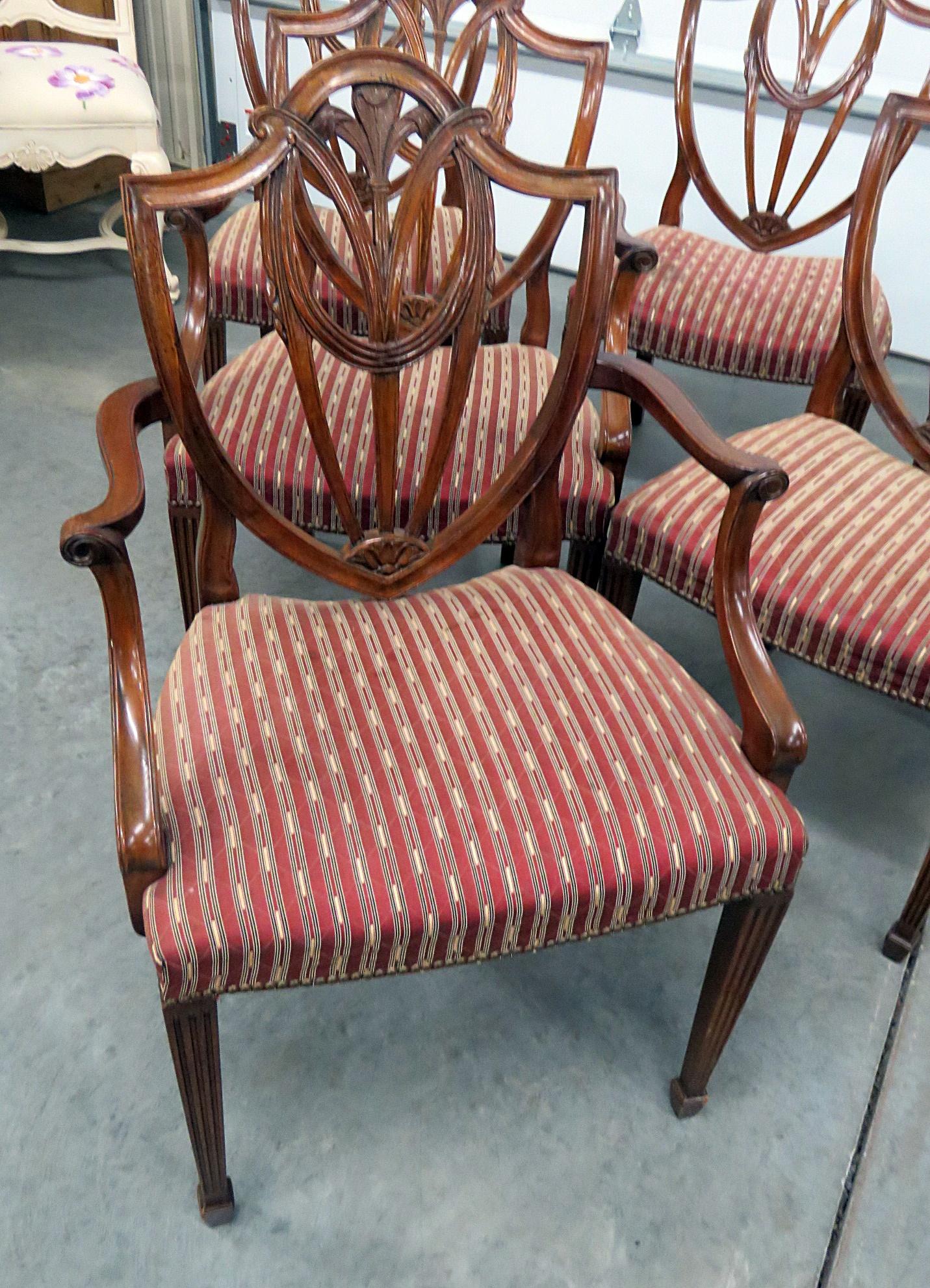 Set of 6 Baker Sheraton style shieldback dining room chairs. The 2 armchairs measure 38