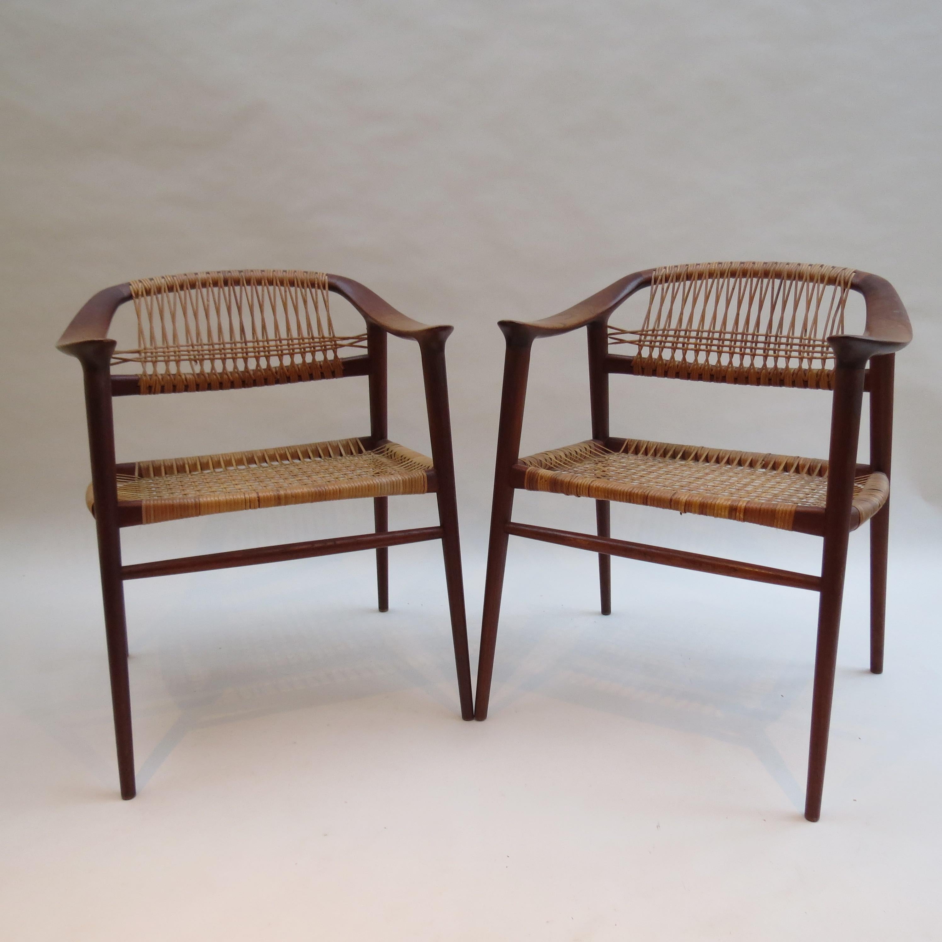 A rare set of 6 dining chairs designed by Rolf Rastad and Adolf Relling and manufactured by Gustav Bahus of Norway. Designed in the 1950s.
Made from solid Teak with original cane work seat and backs.
This set was purchased new and has been with