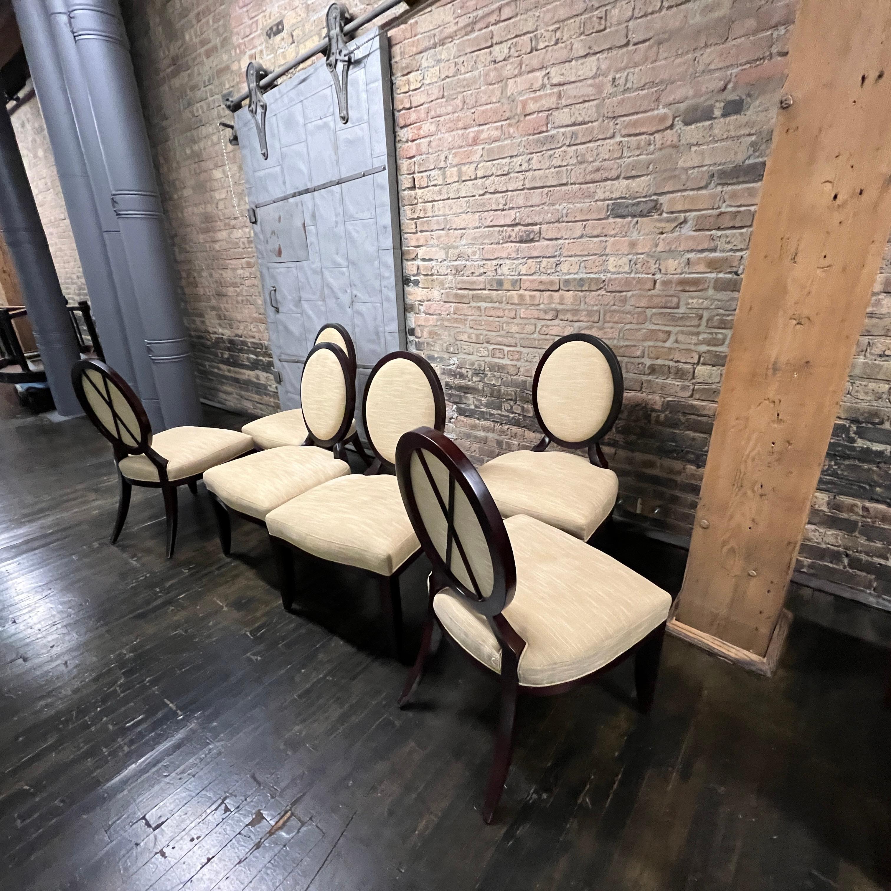 An impressive set of 6 dining chairs designed by Barbara Barry for Baker. This set is without arms (although we do have 2 arm chairs available in a separate listing). These chairs are still in production today (and sell for between $3K - $4K per
