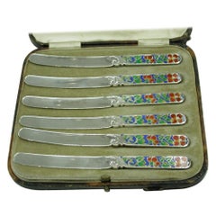 Set of 6 Bernard Instone Multi-Enameled Solid Silver Butter Knives, B'ham, 1929