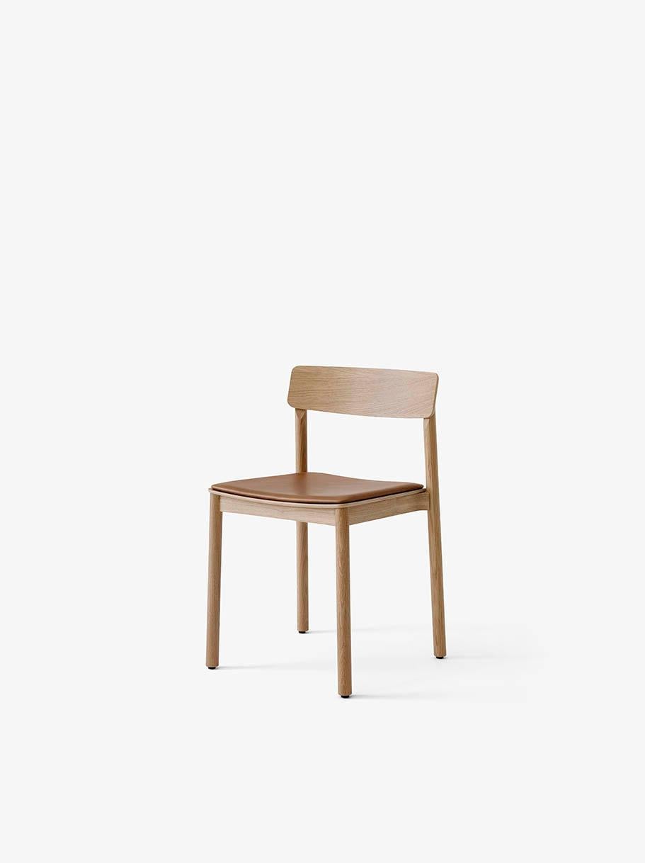Named after the Betty Nansen theater in Copenhagen, this chair boasts an exceptionally durable construction. 
Crafted from solid oak, with an upholstered seat, its simple design promises outstanding comfort. 
The chair is made from solid wood with a