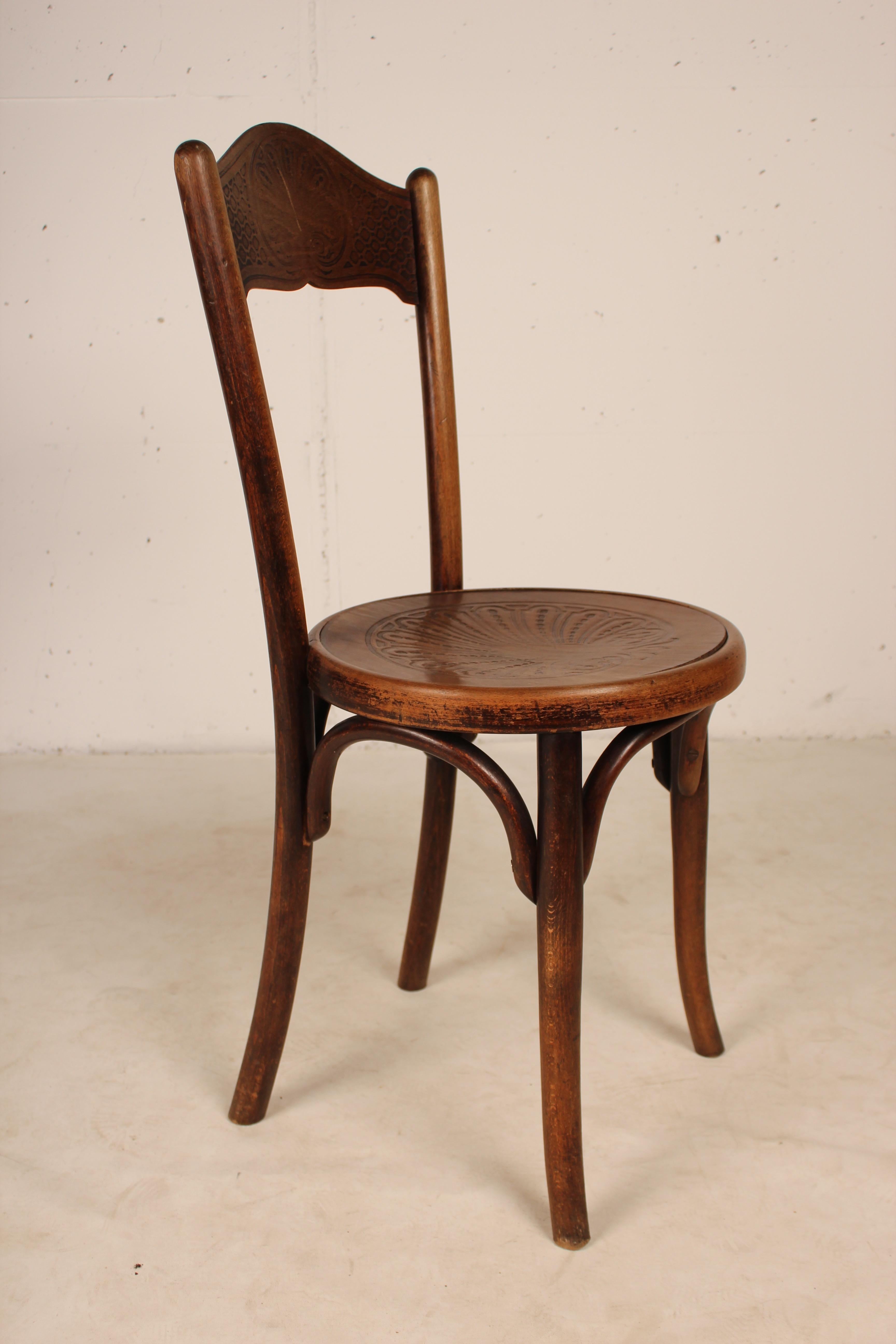 Exceptional and rare set of 6 Bistro chairs by Jacob & Josef Kohn from the end of the 19th century. Bentwood chairs with seats and backs carved with beautiful patterns. All chairs are stamped under the seats. 

  
