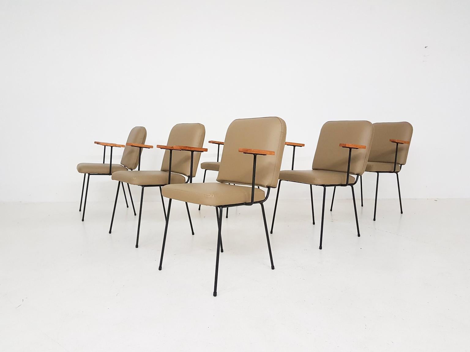 A set of 6 dining chairs with new beige leatherette upholstery. Made in Europe in the midcentury. We are not sure which country, but we think they are Danish, Swedish or Dutch design.

The set is very comfortable because of the thick seating and