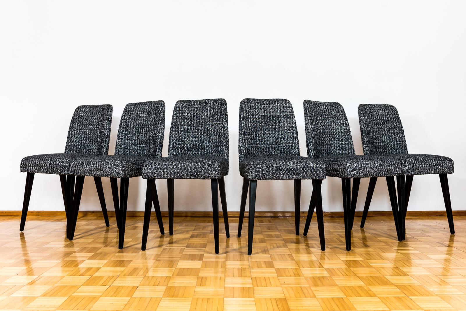 Set of 6 black Mid-Century chairs manufactured in Furniture Factory in Swarzedz, Poland 1960's.
Backrests are made of bent plywood, wooden legs have been completely restored and refinished.
Reupholstered in soft black-grey-white fabric.