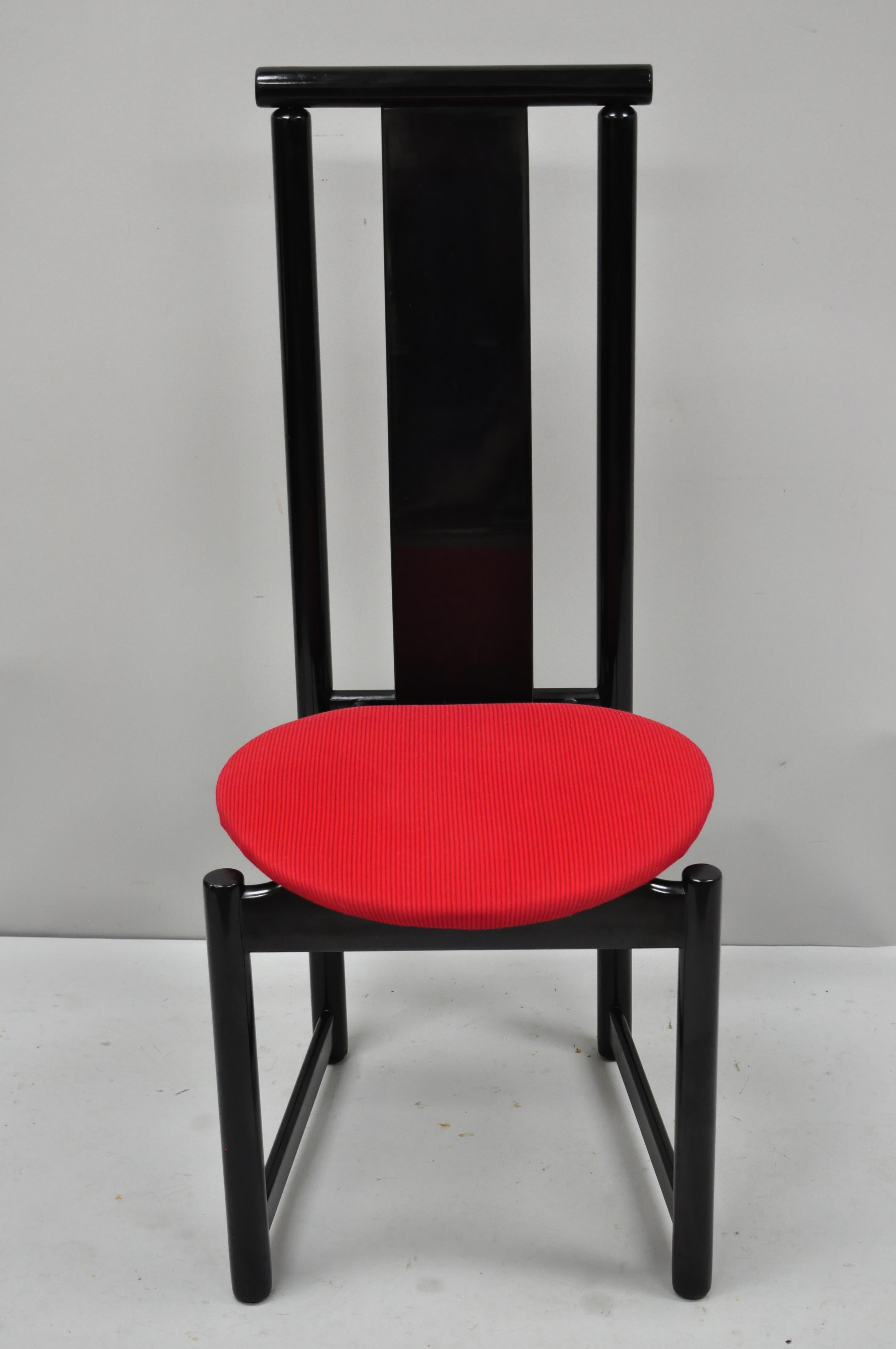 Set of 6 black lacquer post modern memphis style dining chairs red seat. Listing features (6) side chairs, black lacquer solid wood frames, red upholstered seat, sleek sculptural form. Circa late 20th century. Measurements: 39.5