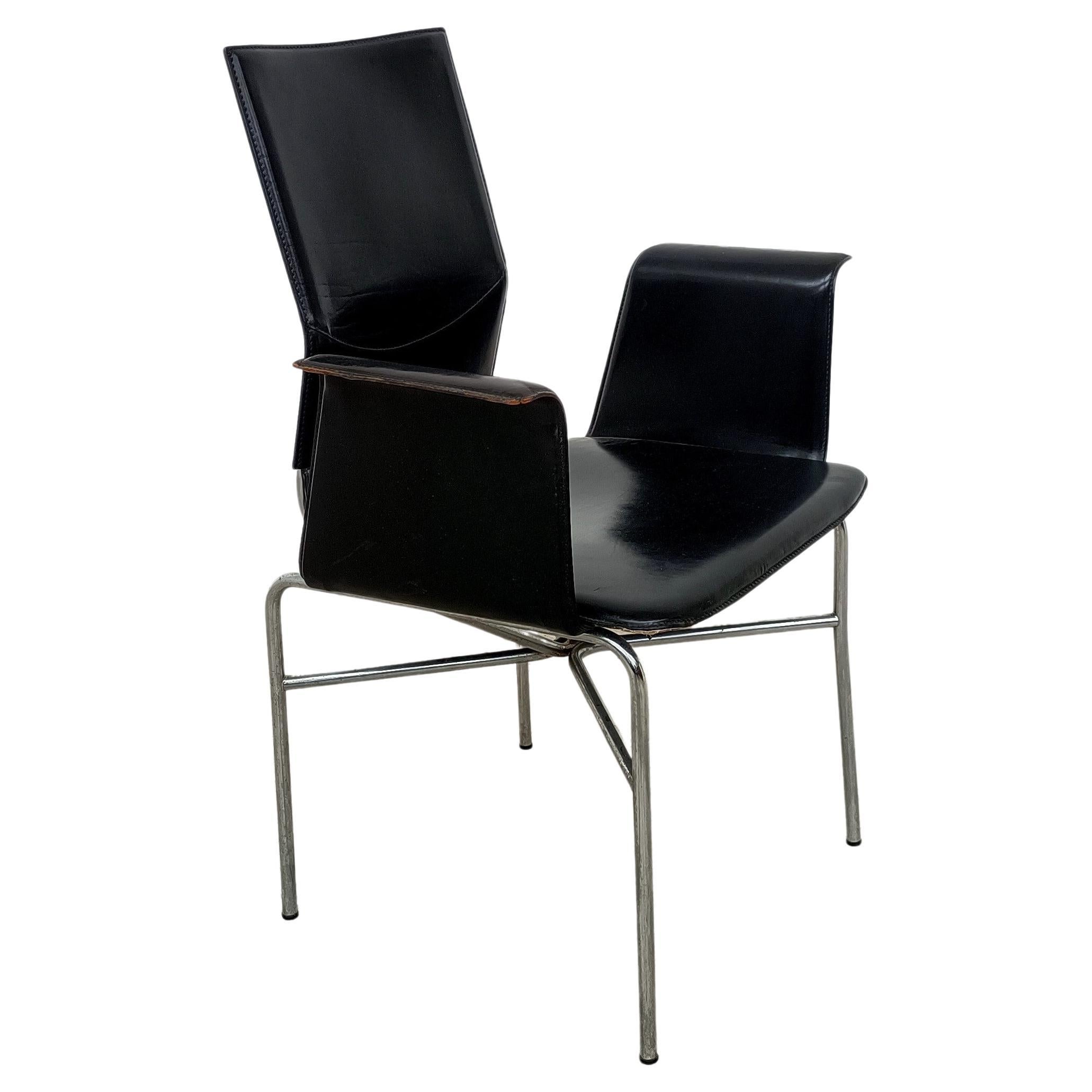 Set of 6 armchairs designed by the american Ross Littell for Matteo Grassi. 
High quality black leather with that kind of patina tht makes them even more charmouse. The steel chromed framegives this transparent and minimalistic look to them. 
The