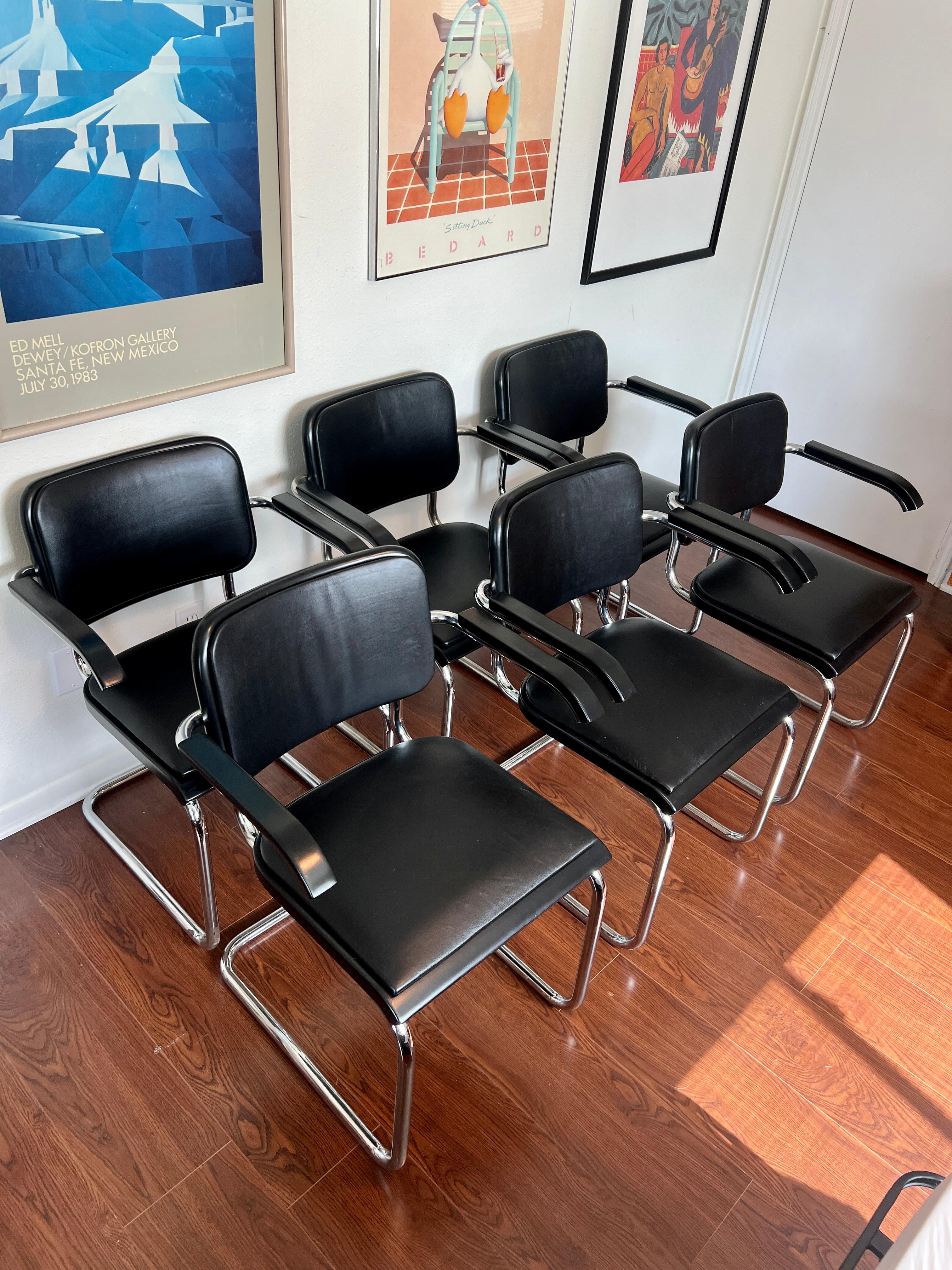 Original ICONIC set of 6 chairs by Marcel Breuer for Thonet model S64. With the original tags from the Enron building circa 1986. A part of Houston history. Newly reupholstered in a premium black cowhide leather and the black frames have also been