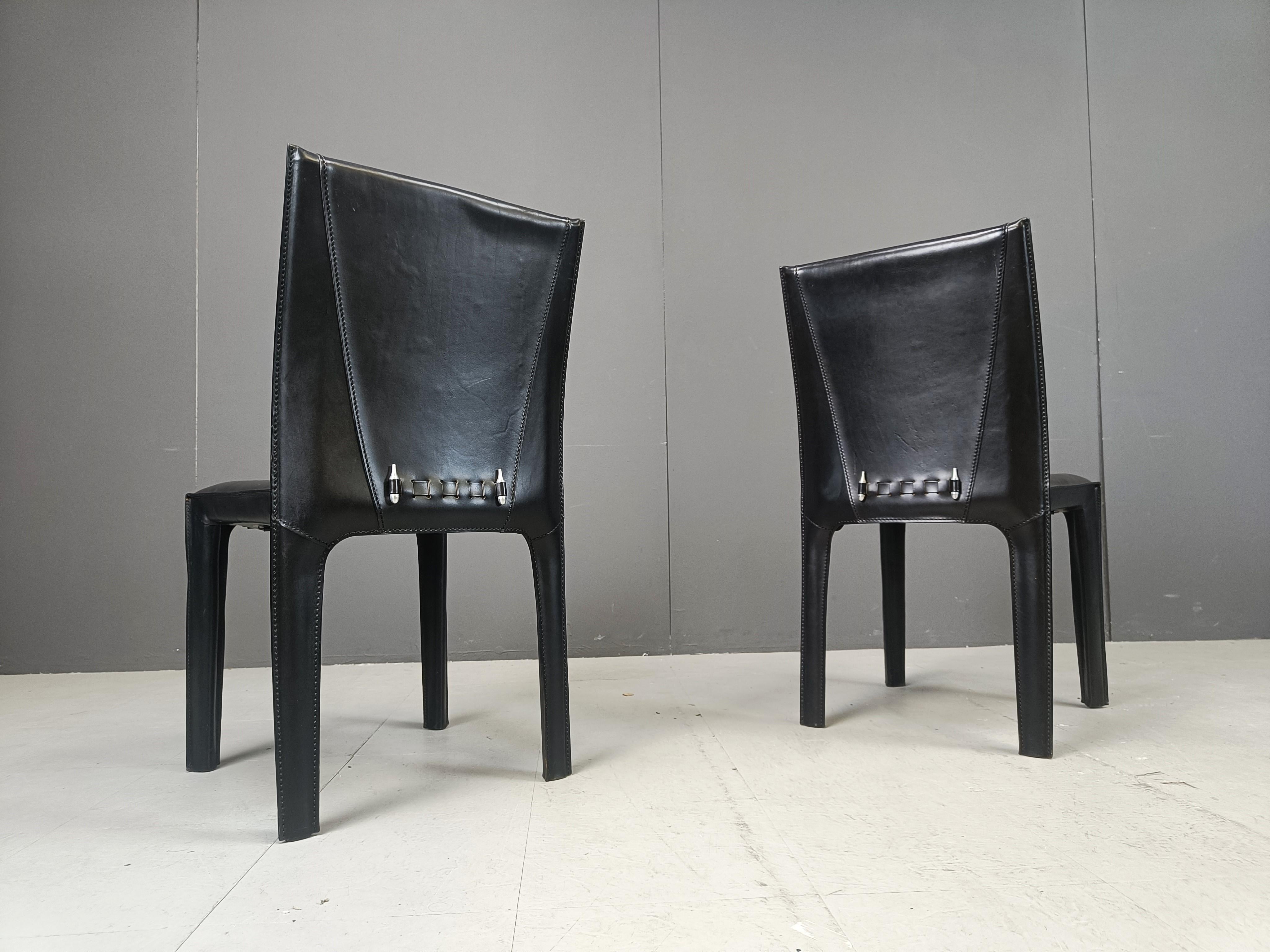 
Set of 6 black sttiched leather dining chairs by Arper Italy.

Very sturdy and timeless design chairs.

Condition as nerw, very well maintained by the previous owner

1980s - Italy

Dimensions:
Height: 85cm/33.46