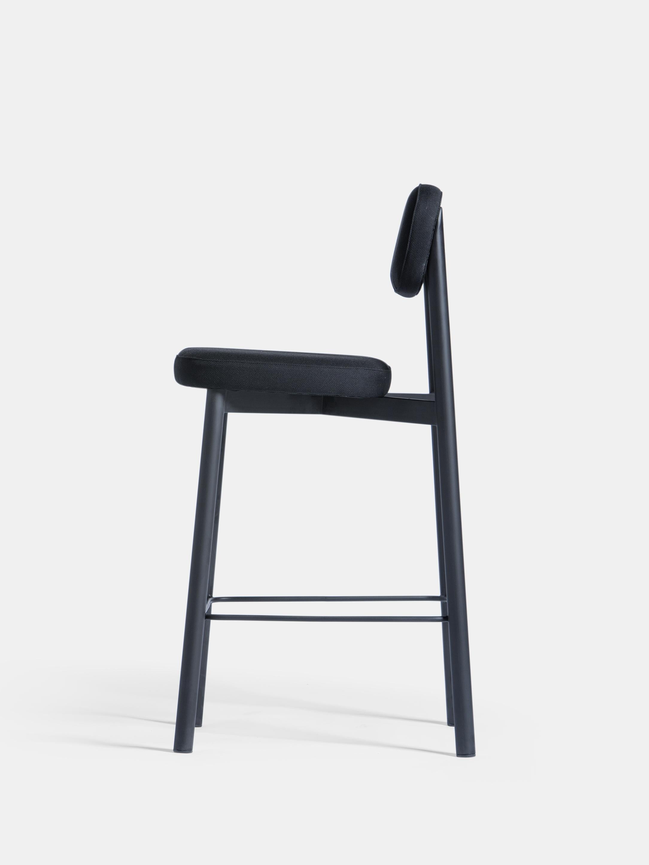 Set of 6 Black Residence 65 Counter Chairs by Kann Design
Dimensions: D 50 x W 46 x H 93 cm.
Materials: Steel tube, HR foam, fabric upholstery Kvadrat Relate 191 (100% Trevira).
Available in other colors.

All of the Residence seats were created by