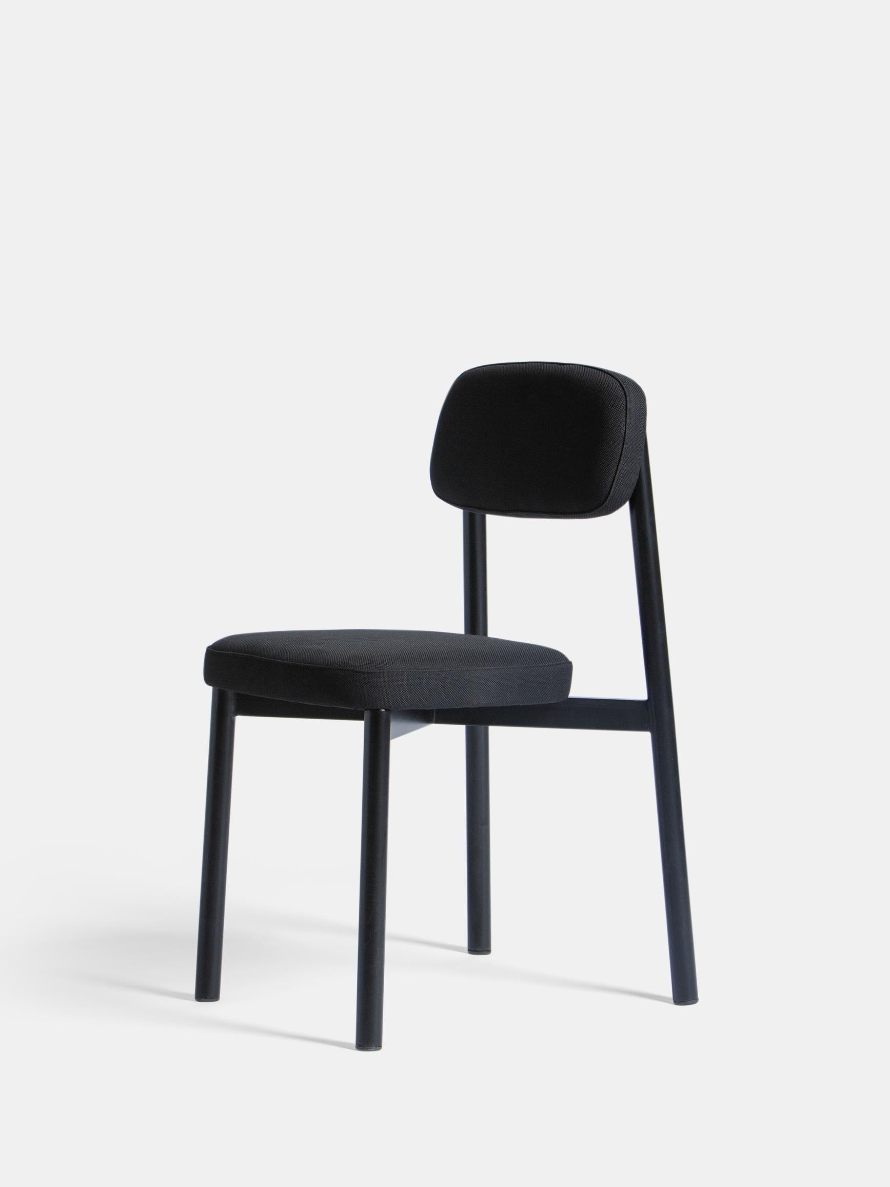 Set of 6 Black Residence Chairs by Kann Design
Dimensions: D 43 x W 50 x H 77 cm.
Materials: Steel tube, HR foam, fabric upholstery Kvadrat Relate 191 (100% Trevira).
Available in other colors.

All of the Residence seats were created by designer