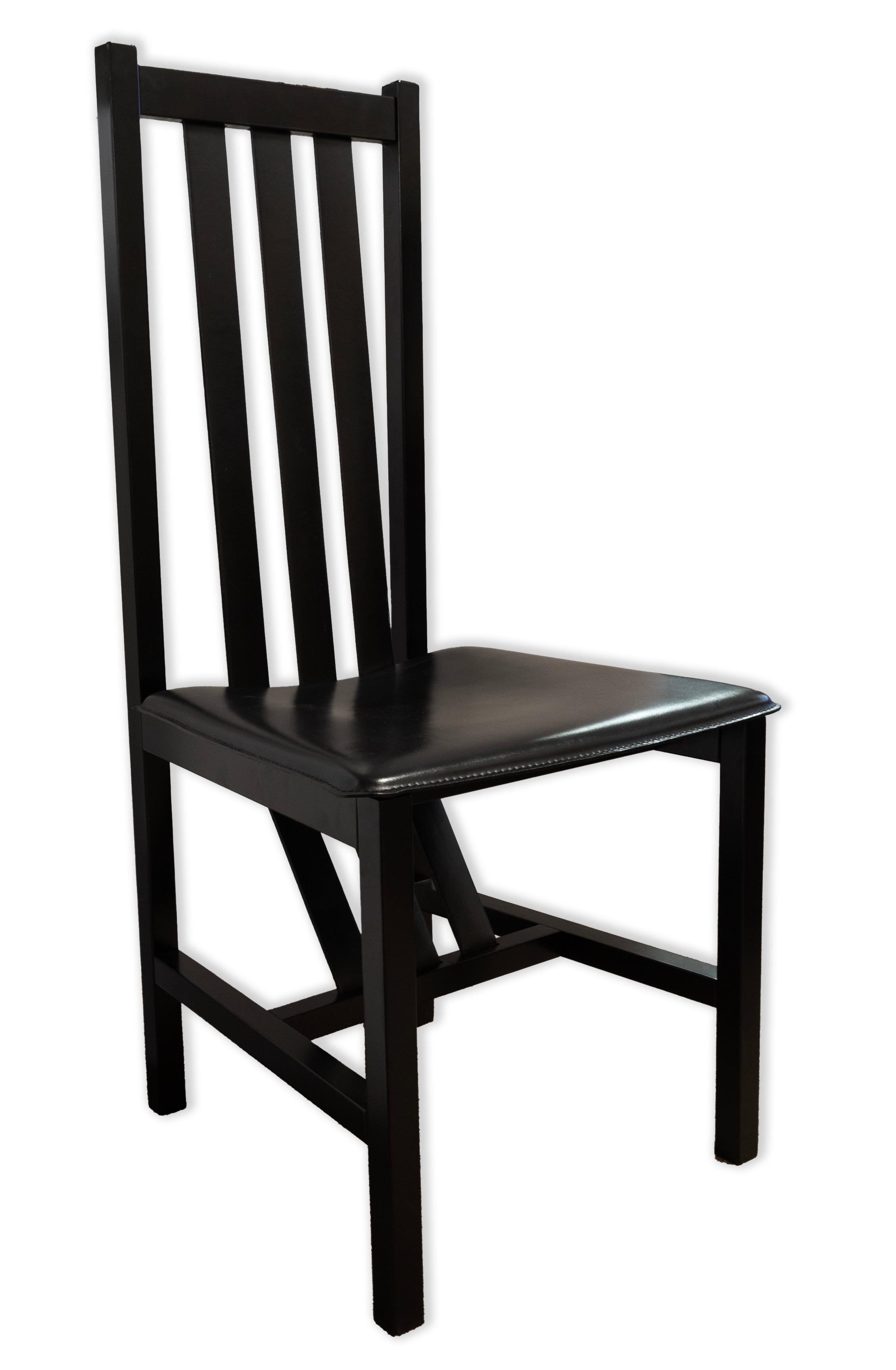 A set of 6 contemporary modern dining chairs made in Italy. This lovely set of chic dining chairs feature a very clean and sophisticated modern design. Each of these chairs are constructed with a sturdy wood frame and leather straps donning the back