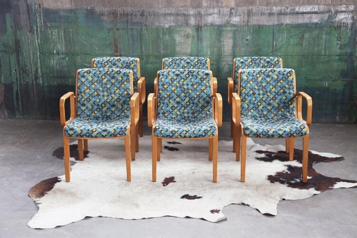 Here is an incredible, Rare Set of 6 Post Modern Knoll Oak bentwood upholstered armchairs. The seats are upholstered in a sturdy and very cool Blue pattern textile.
Price is for the entire set of six.

The 1305-U model of this Knoll chair was made