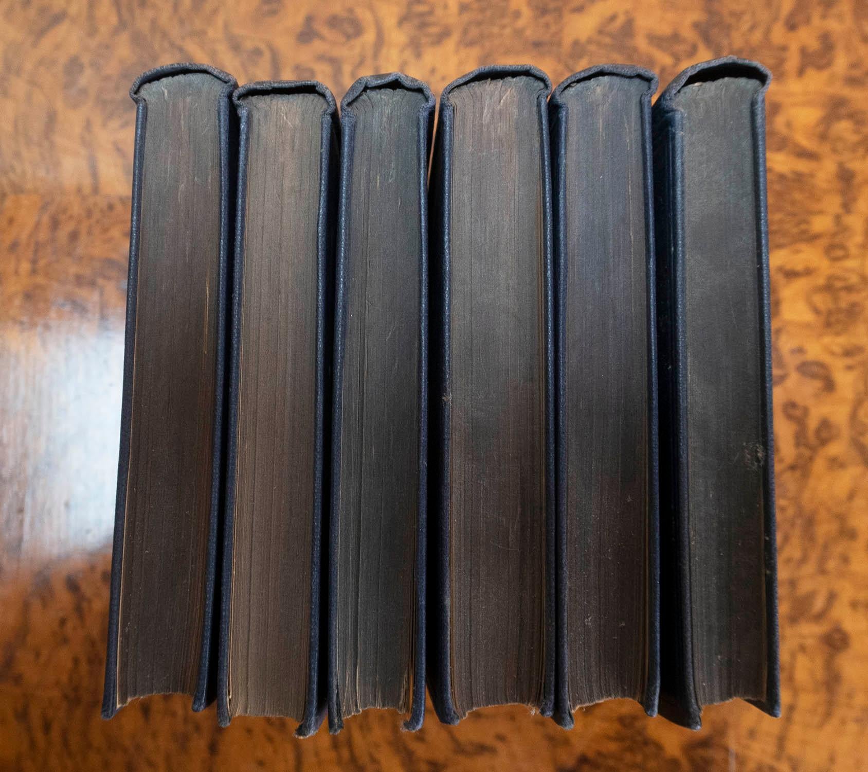 Set of 6 Blue Cloth Bound Books. The Works of H.H Munro.