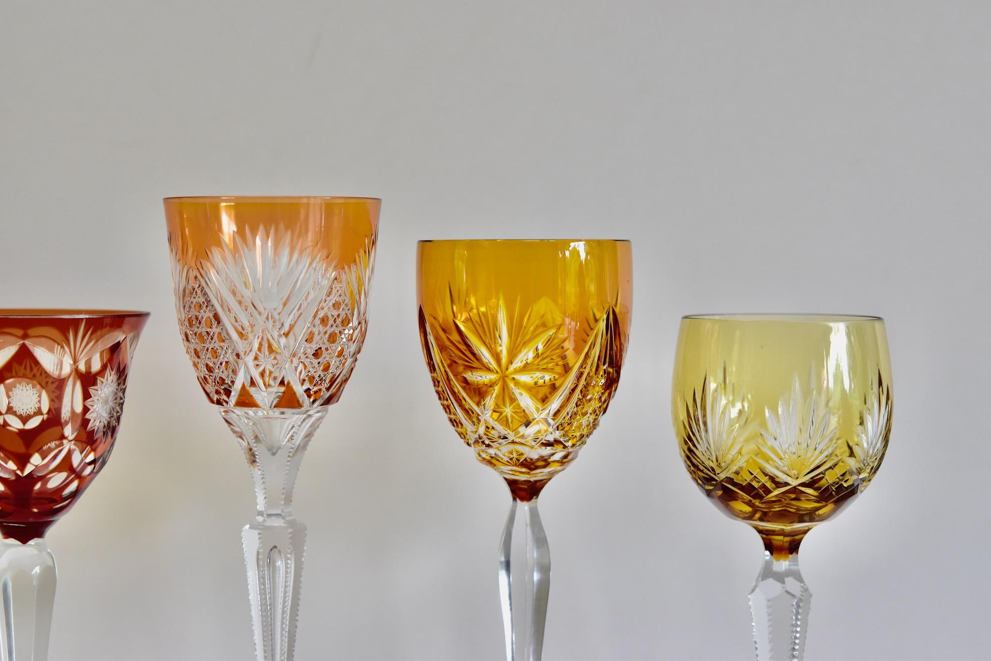 Lot of six antque crystal Bohemian wine glasses. Different in color, shape, cut and size.
Originals from the 1930-1960s. Mouthblown and handcut. No damages, no chips only smal signs of use.

Measurements from diameter 7cm/2.7in and height from